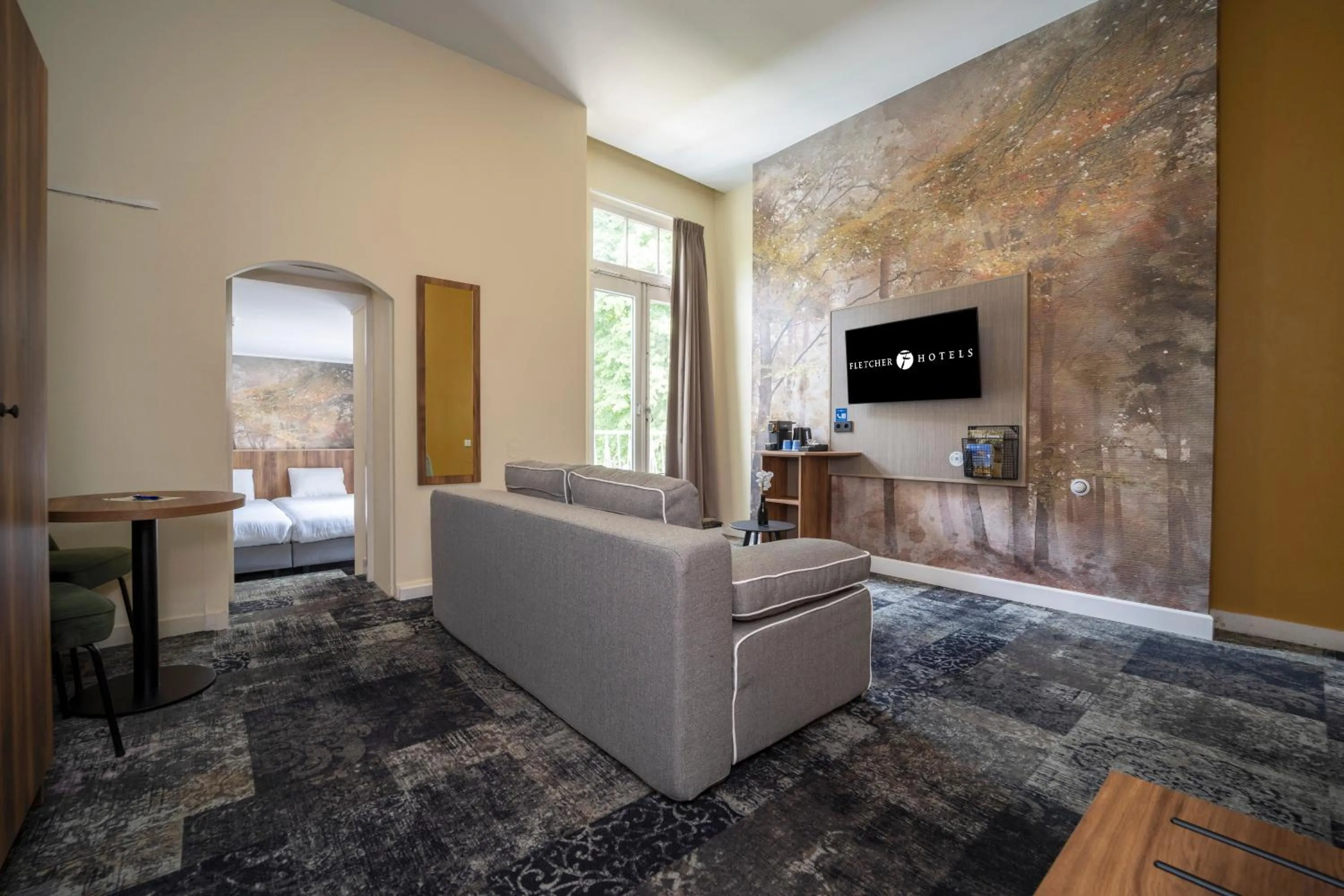 TV and multimedia in Fletcher Hotel Restaurant Erica