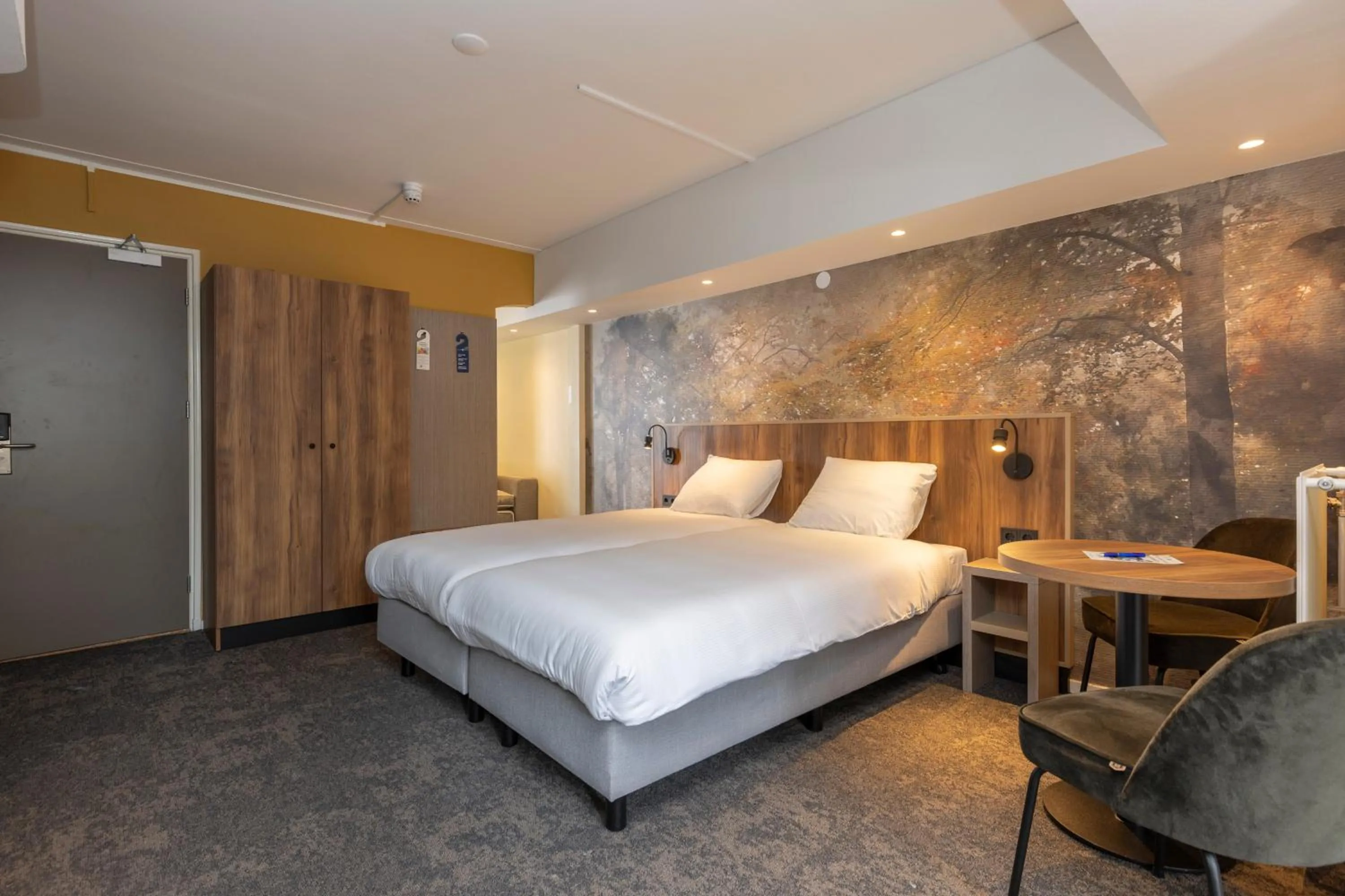 Bed in Fletcher Hotel Restaurant Erica