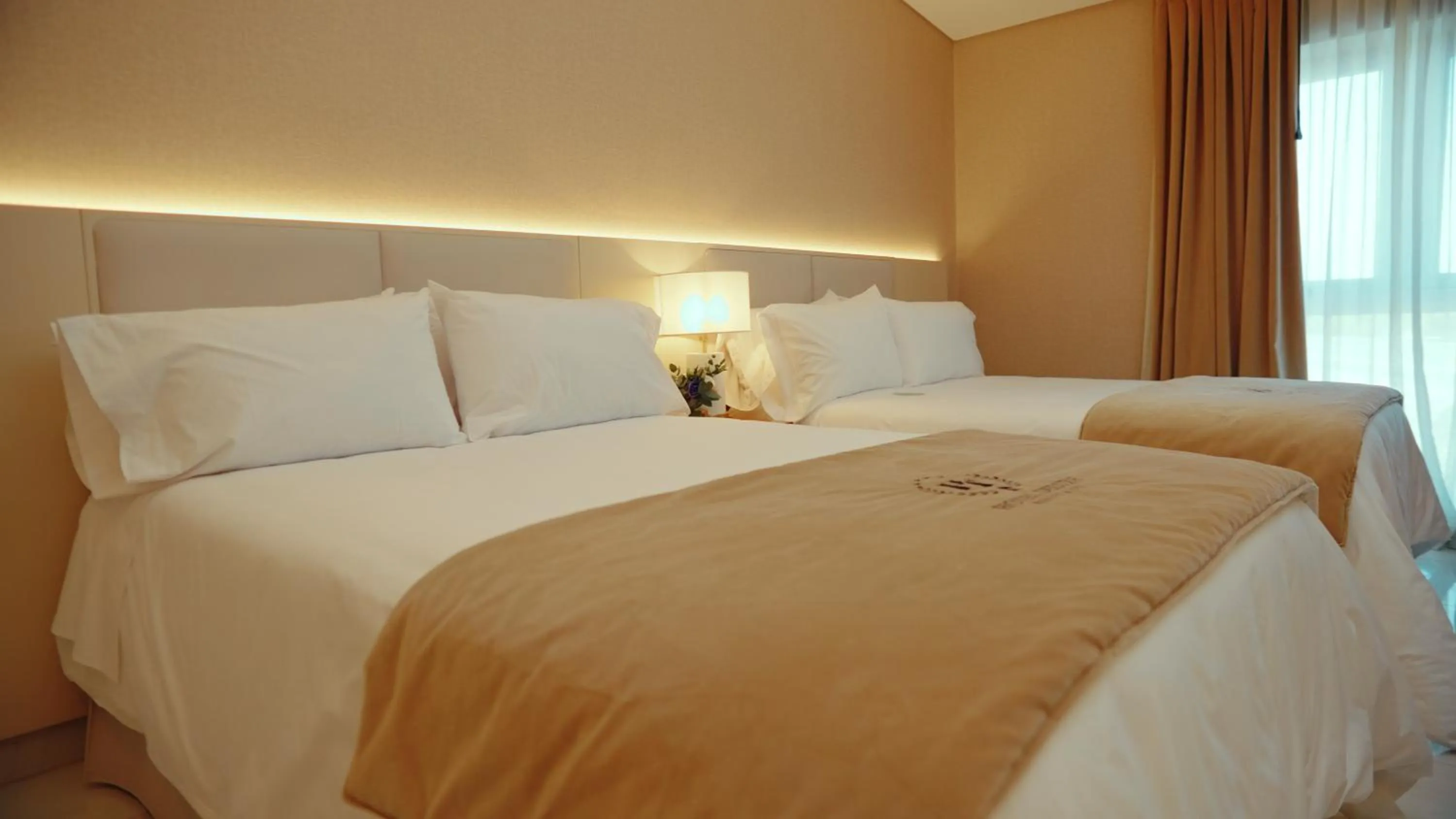 Bedroom in HT Hotel Deluxe Resort & SPA