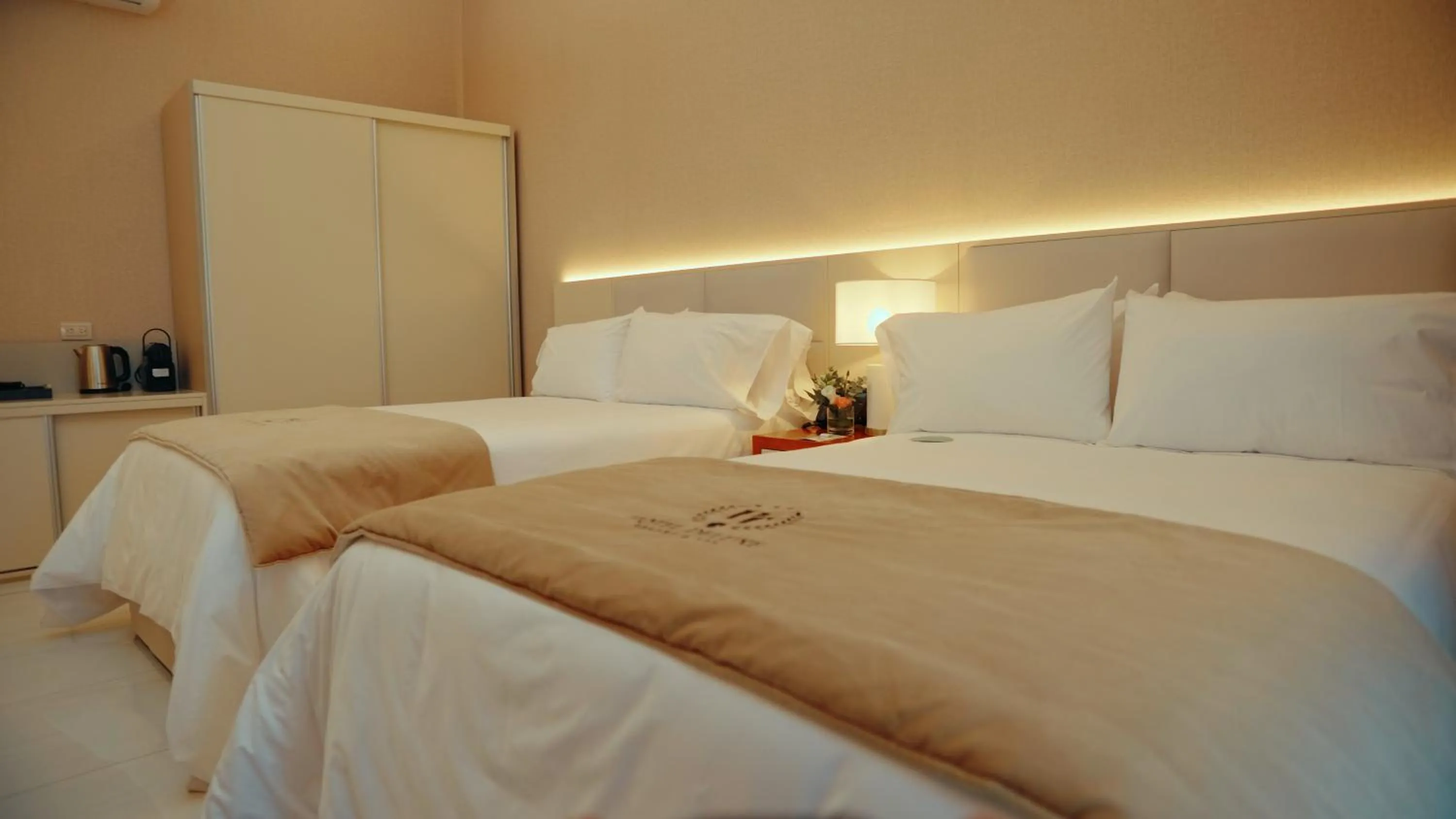 Bedroom in HT Hotel Deluxe Resort & SPA