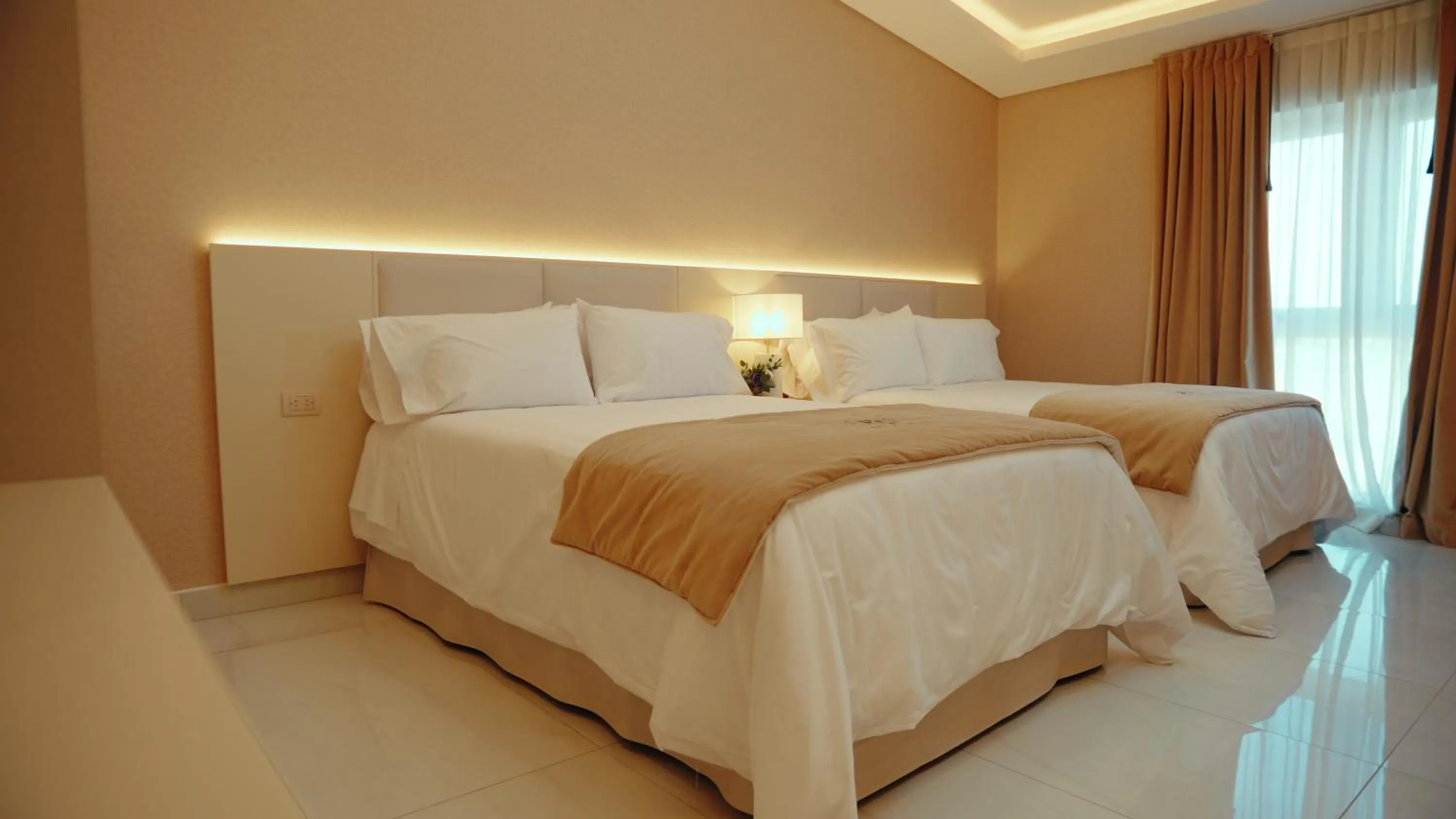 Bedroom in HT Hotel Deluxe Resort & SPA