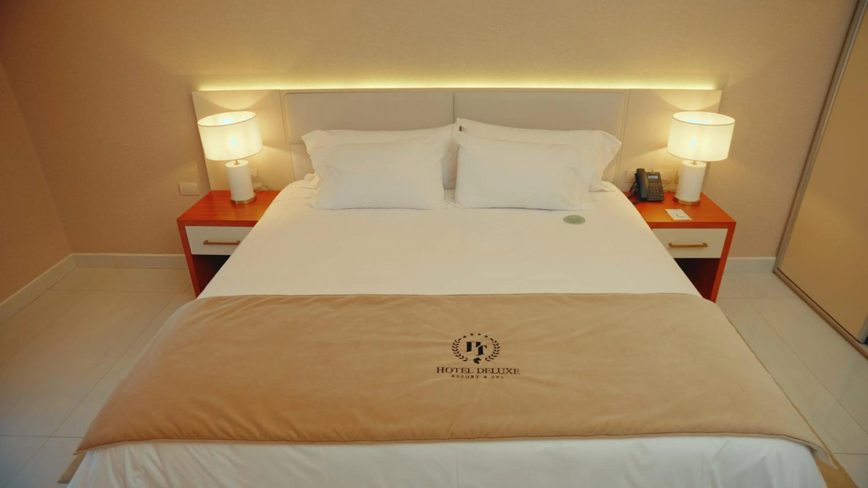 Bedroom in HT Hotel Deluxe Resort & SPA