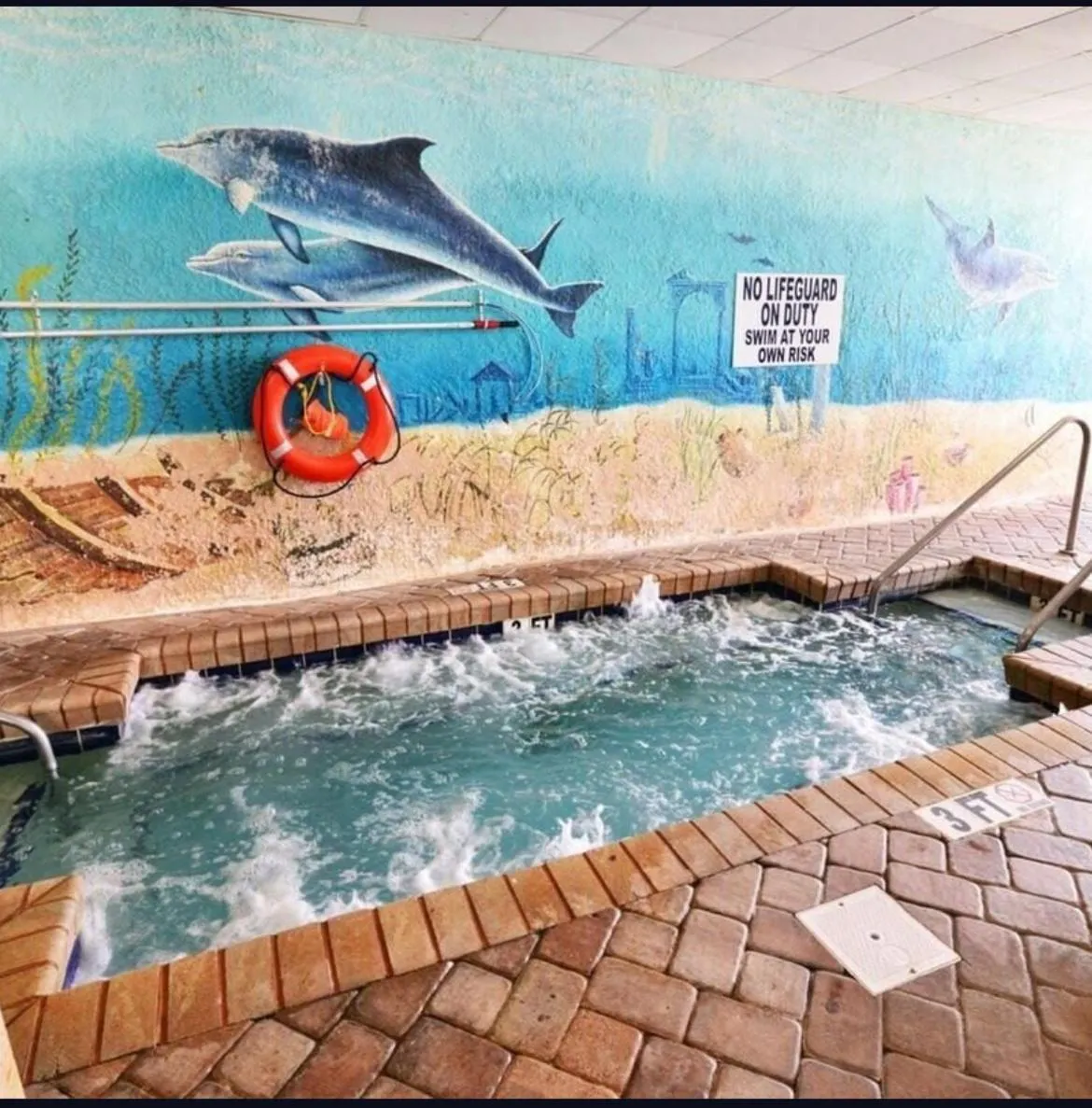 Hot Tub in Flip Flop at Compass Cove