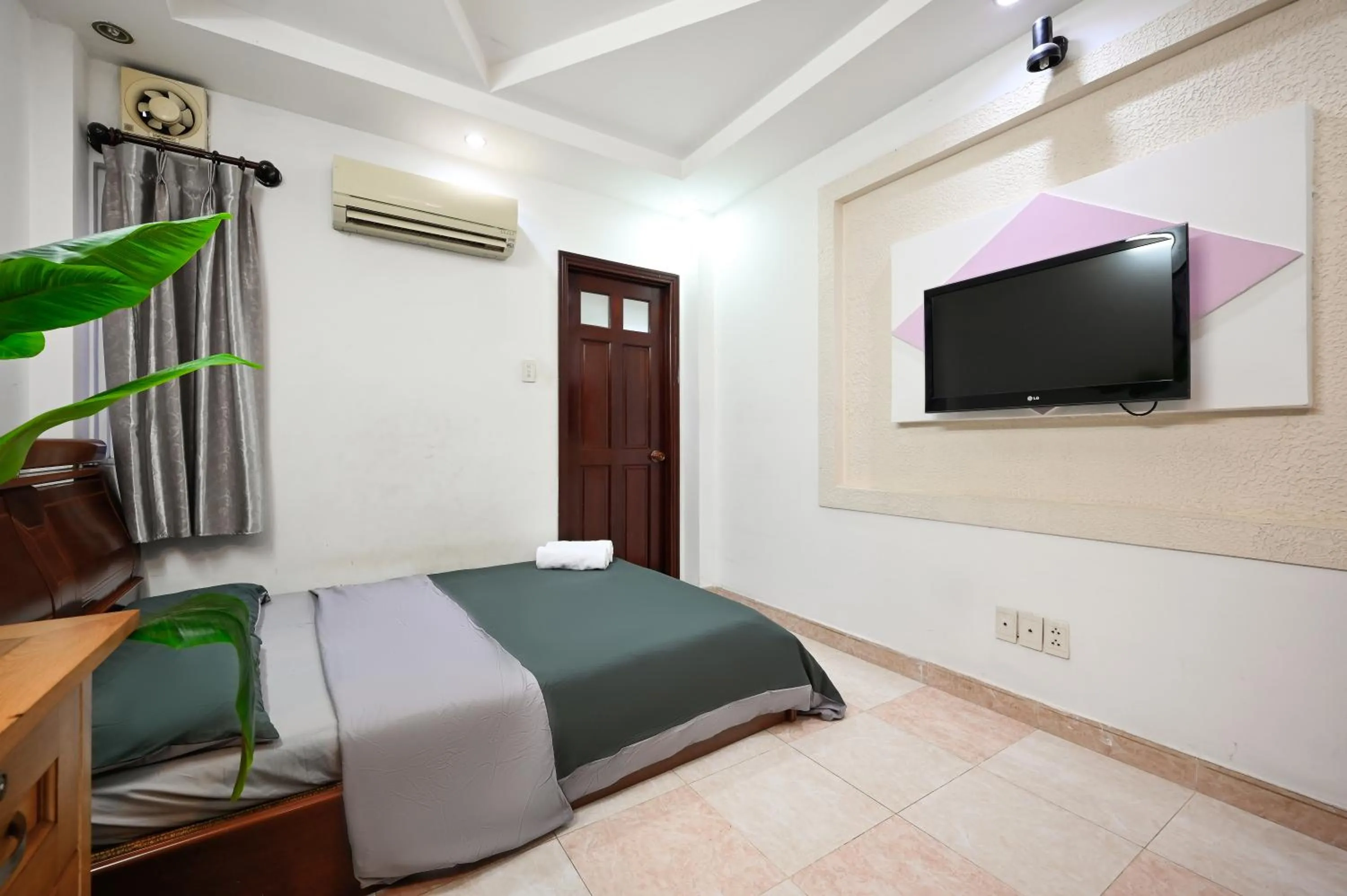 Bed in Ohio Hotel & Apartment