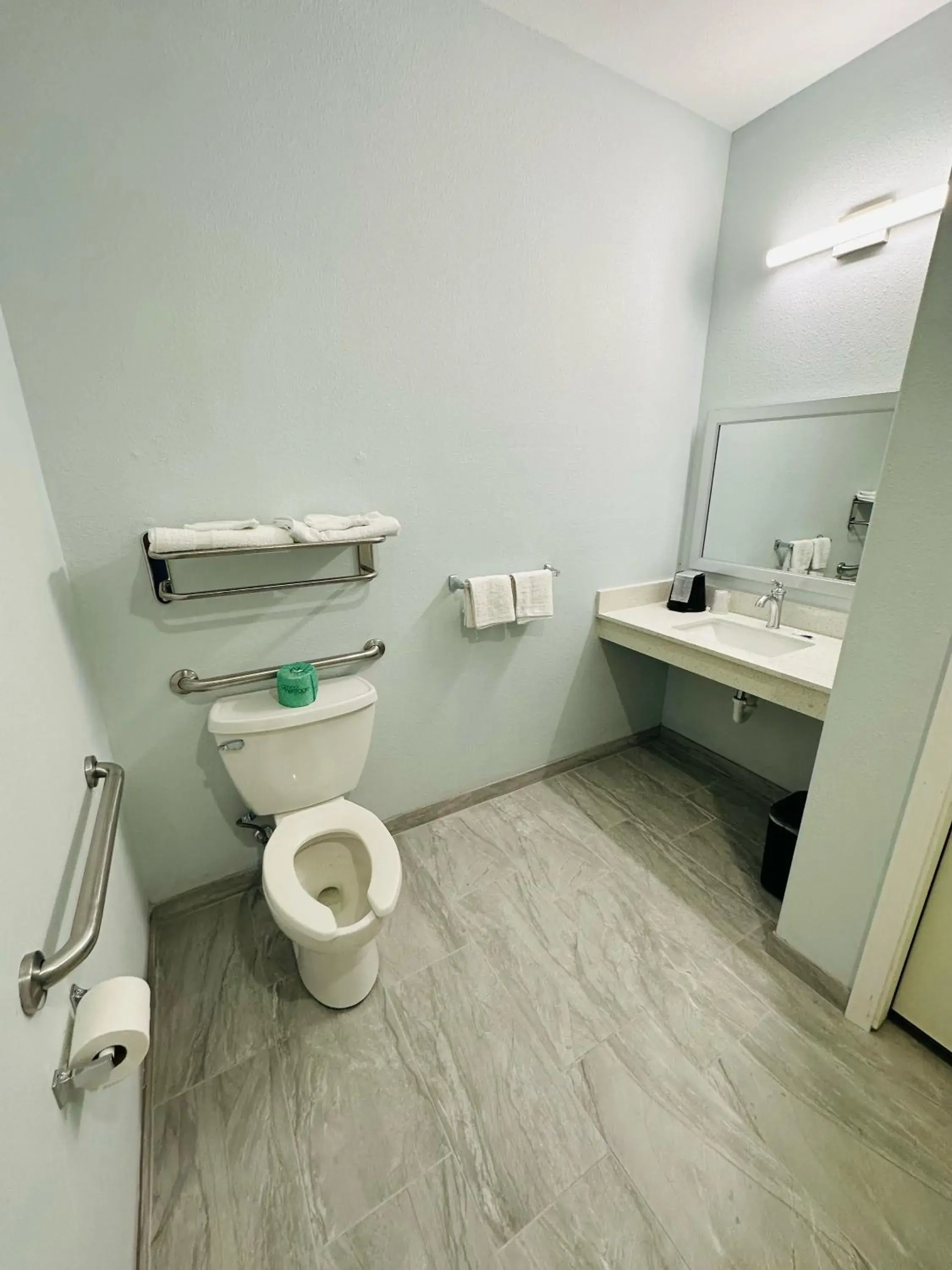 King Room with Roll-In Shower - Disability Access in Crosby Travel Lodge and RV Park King Room with Roll-In Shower - Disability Access in Crosby Travel Lodge and RV Park
