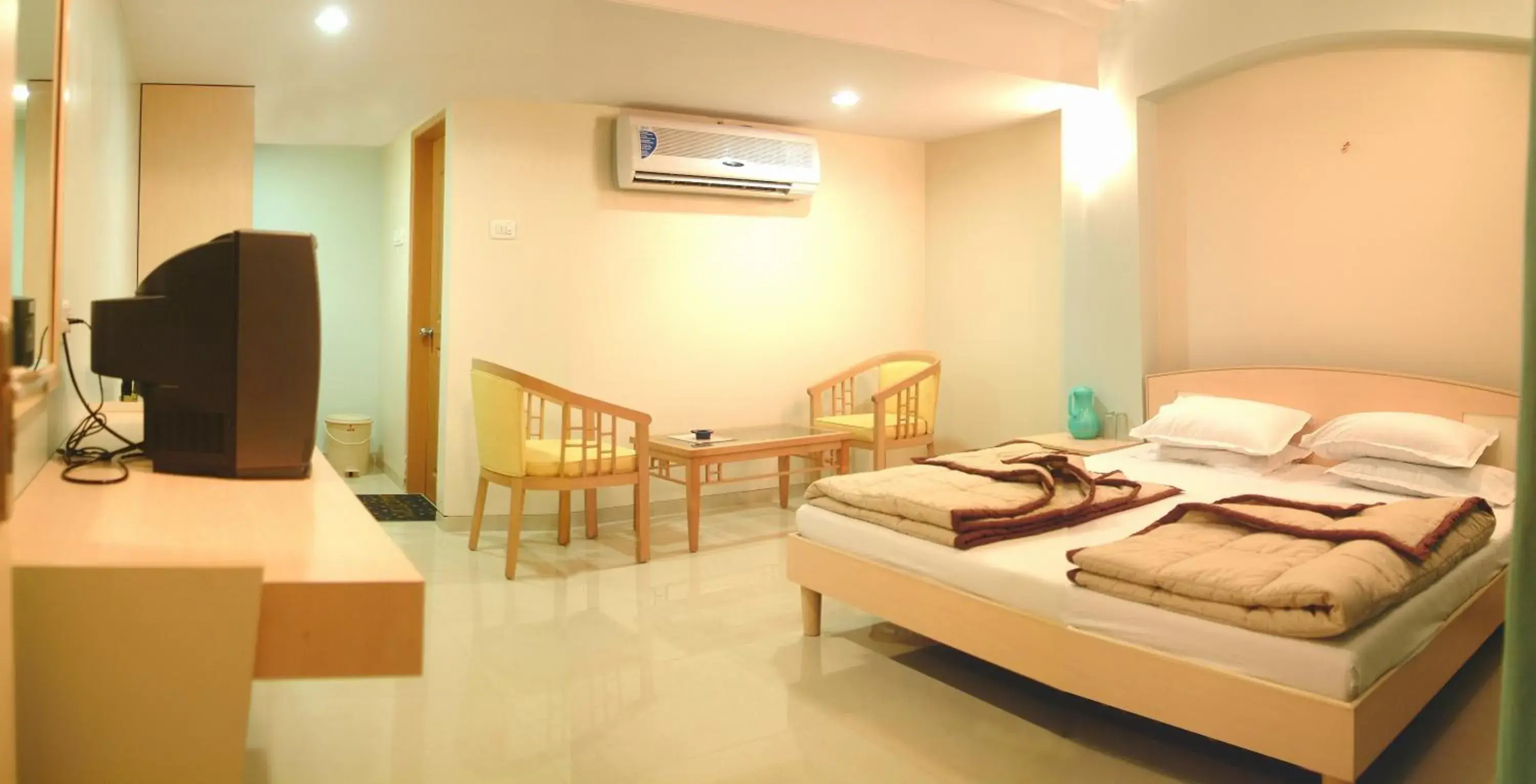 Double Room with Pool View in Hotel Ravikiran Alibaug Double Room with Pool View in Hotel Ravikiran Alibaug