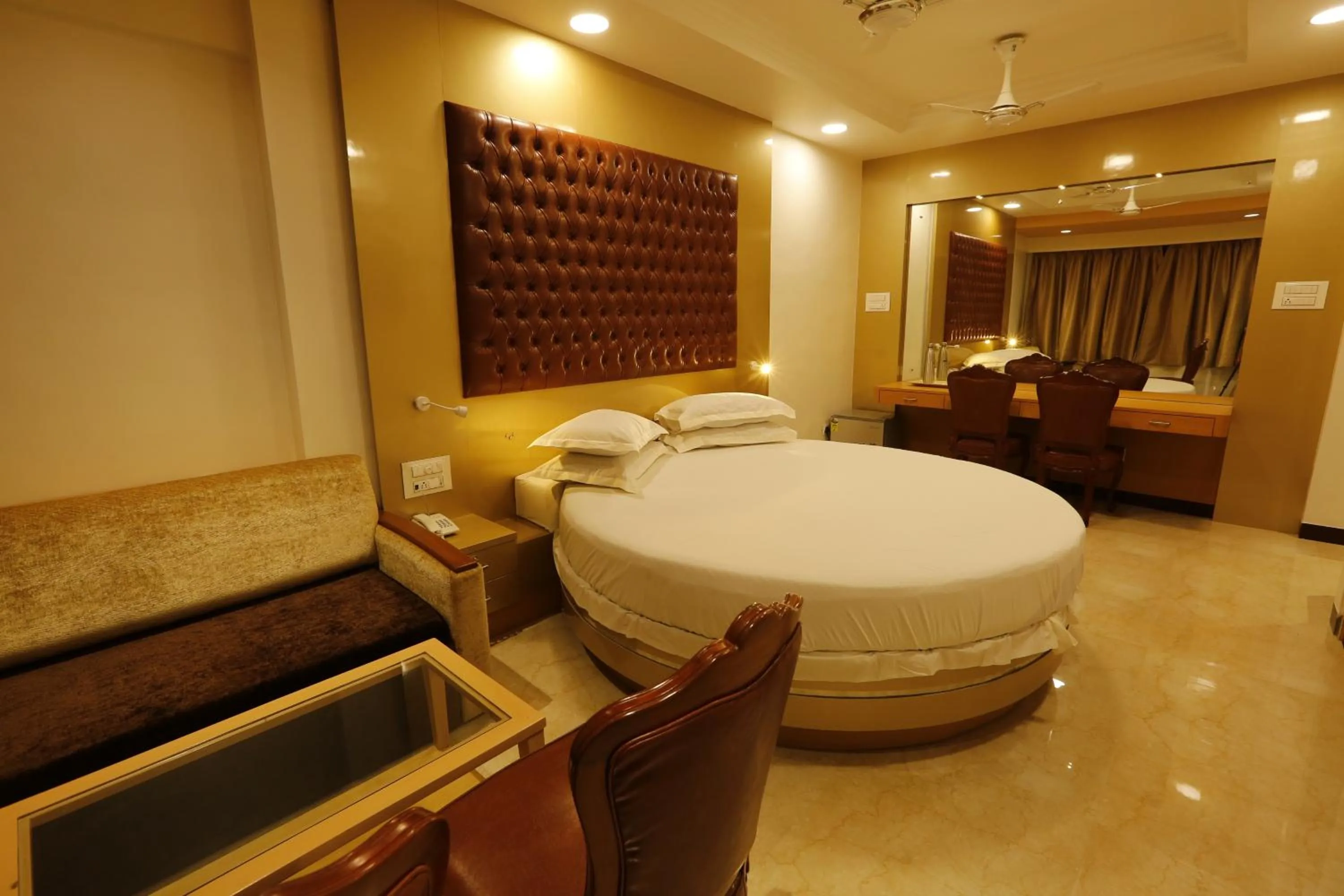 Bed in Hotel Ravikiran Alibaug