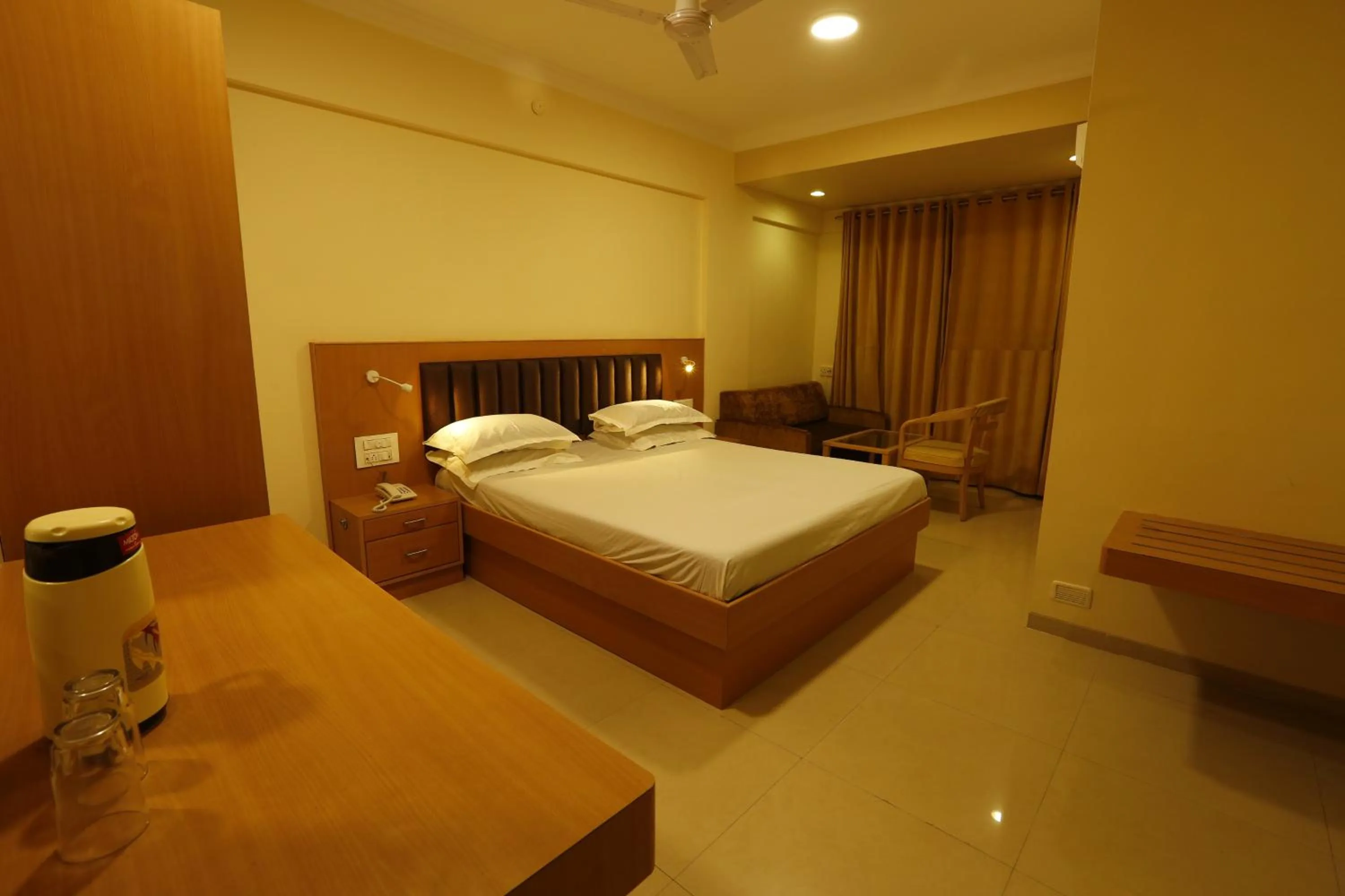 Bed in Hotel Ravikiran Alibaug