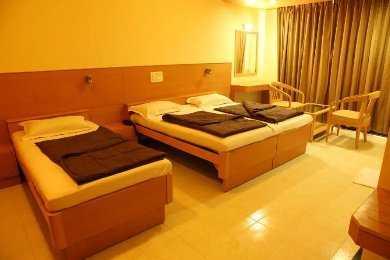 Triple Room with Private Bathroom in Hotel Ravikiran Alibaug Triple Room with Private Bathroom in Hotel Ravikiran Alibaug