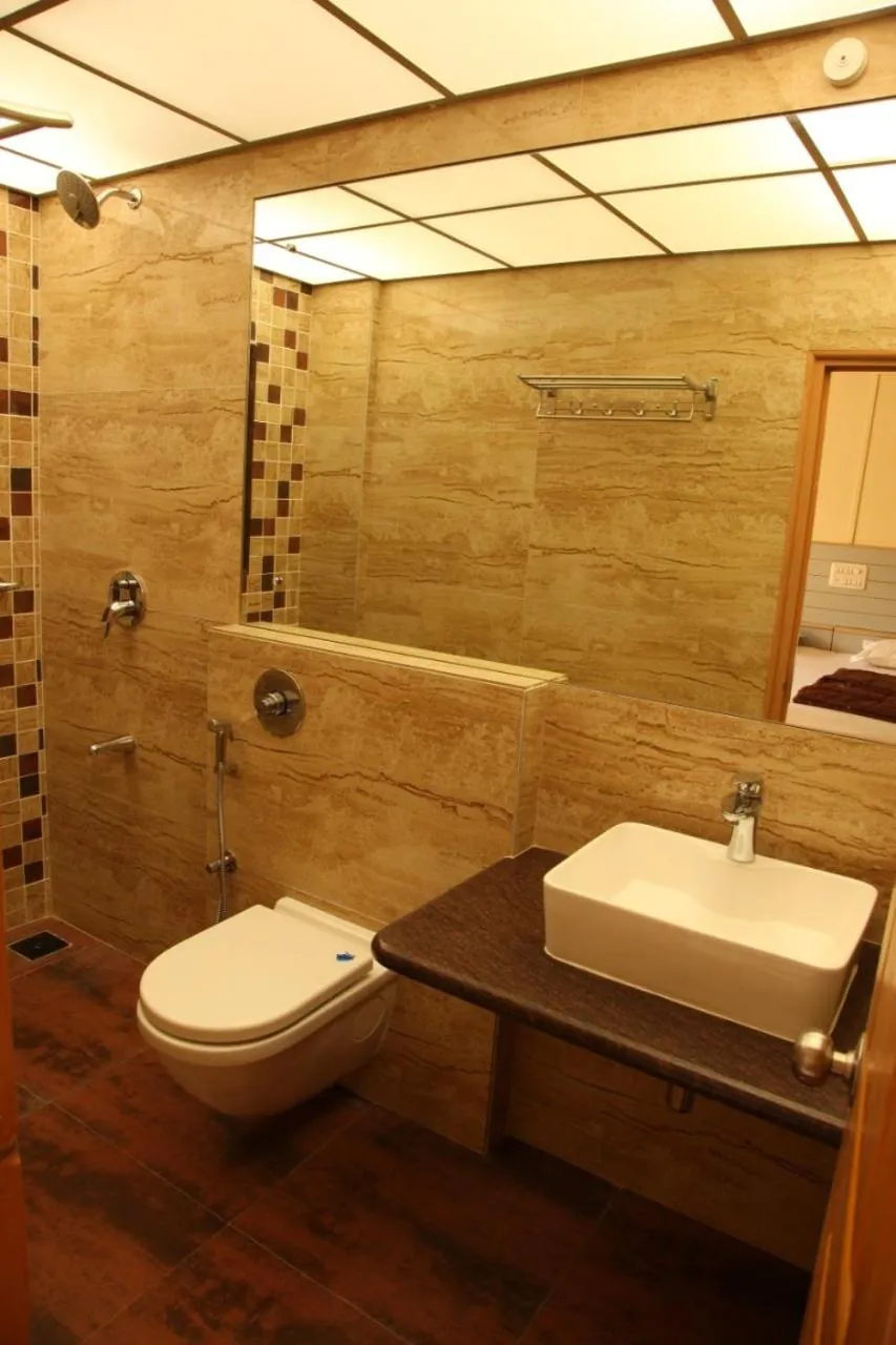 Bathroom in Hotel Ravikiran Alibaug