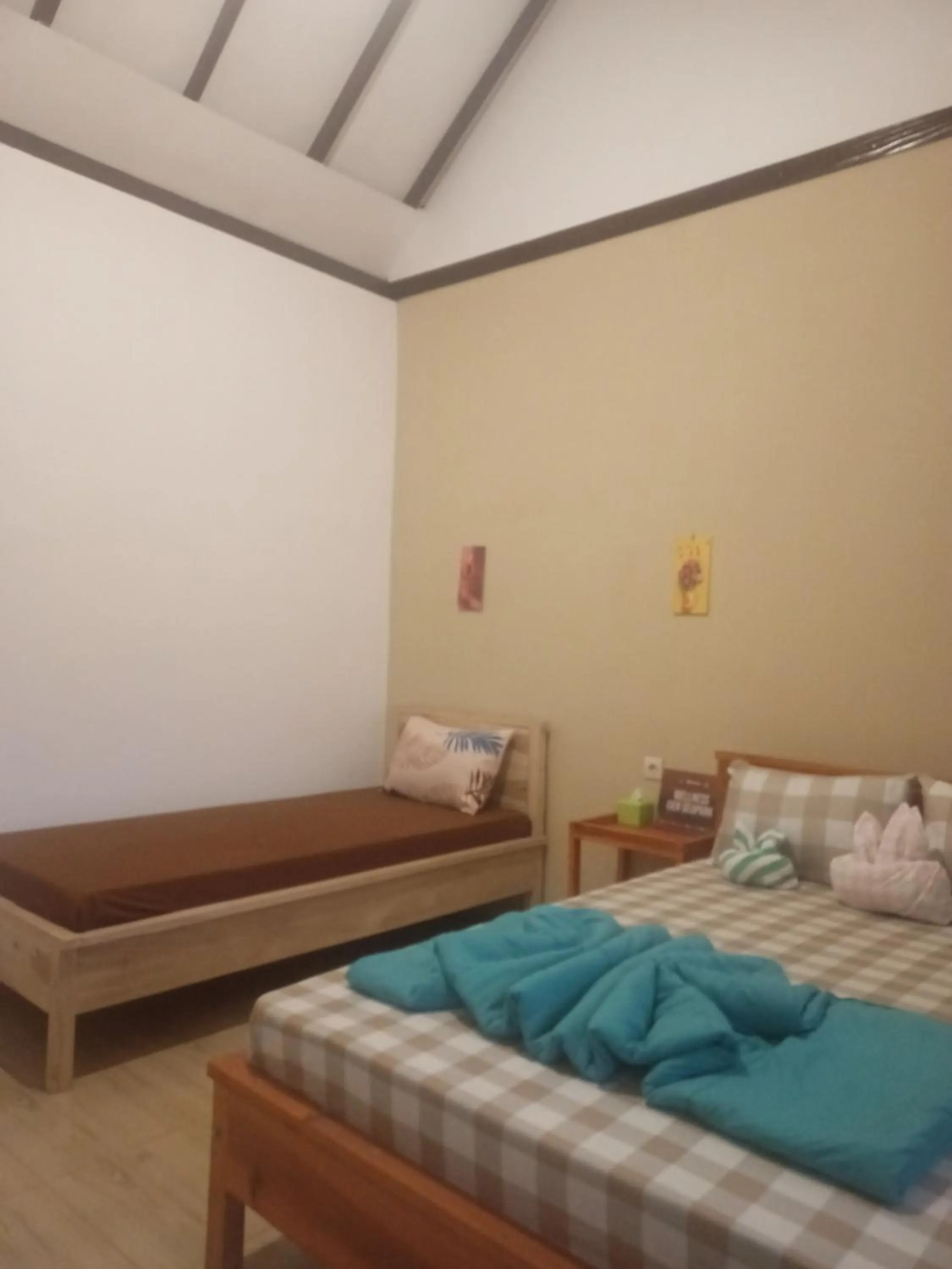 Bed in FAREL HOMESTAY KAWAHIJEN