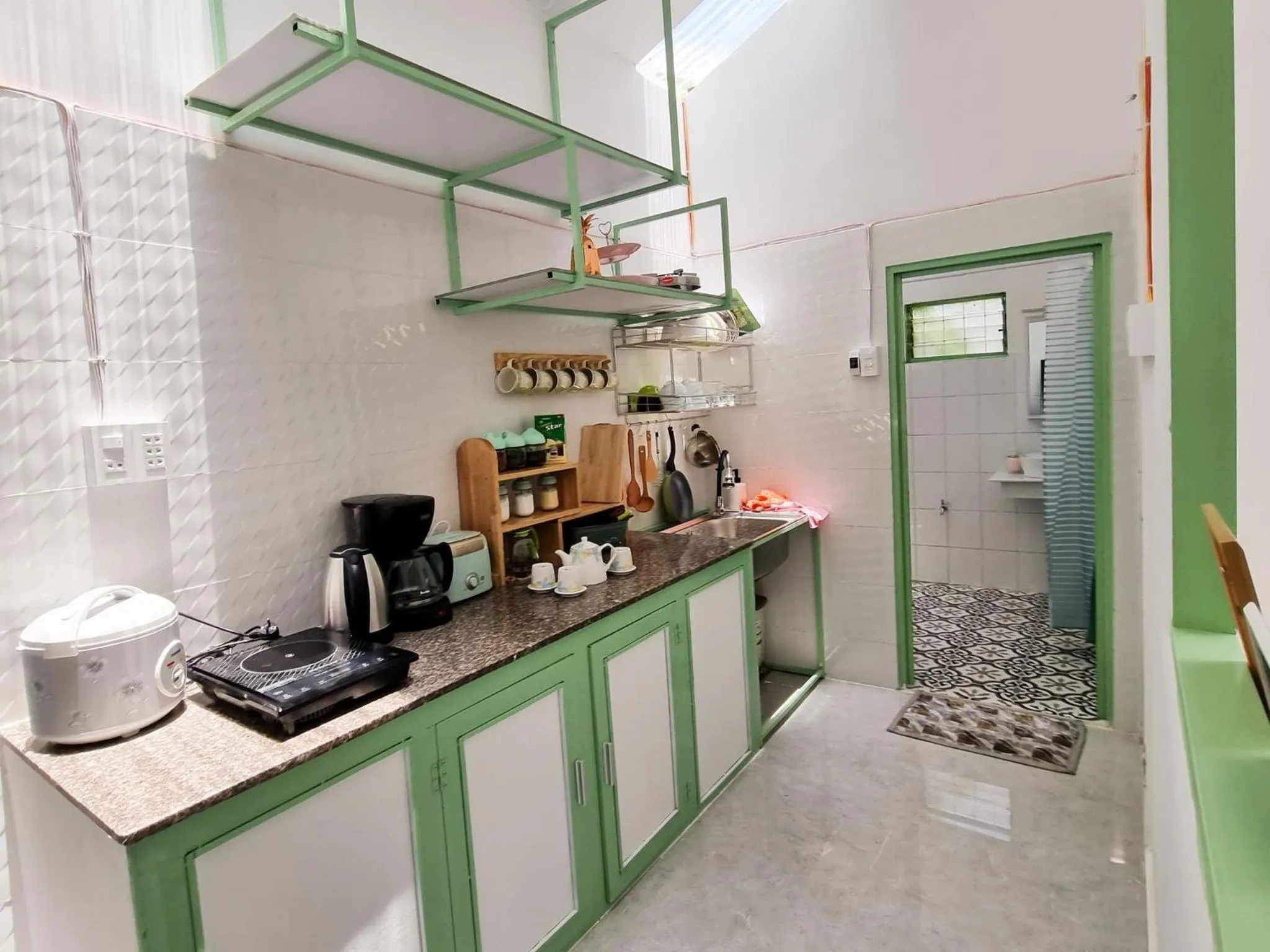 Kitchen or kitchenette in Anh Quân House