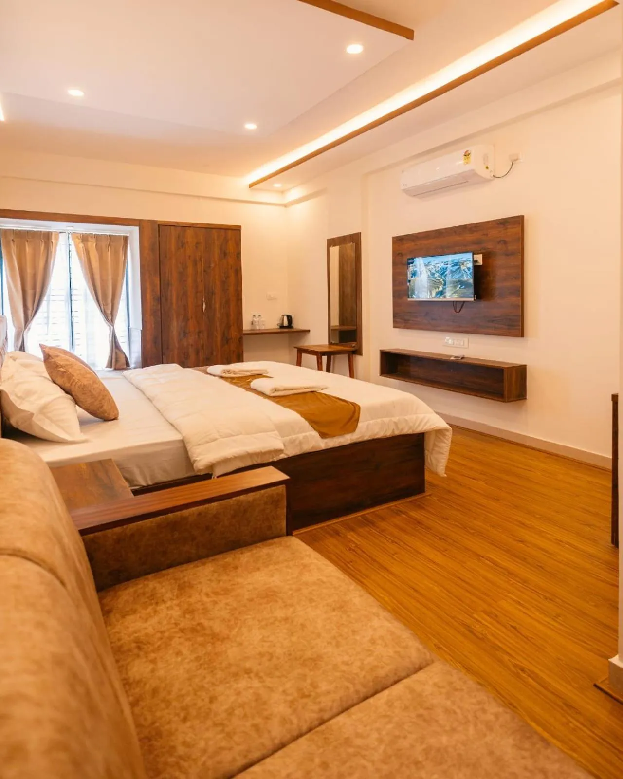 Bed in Uptown Suites