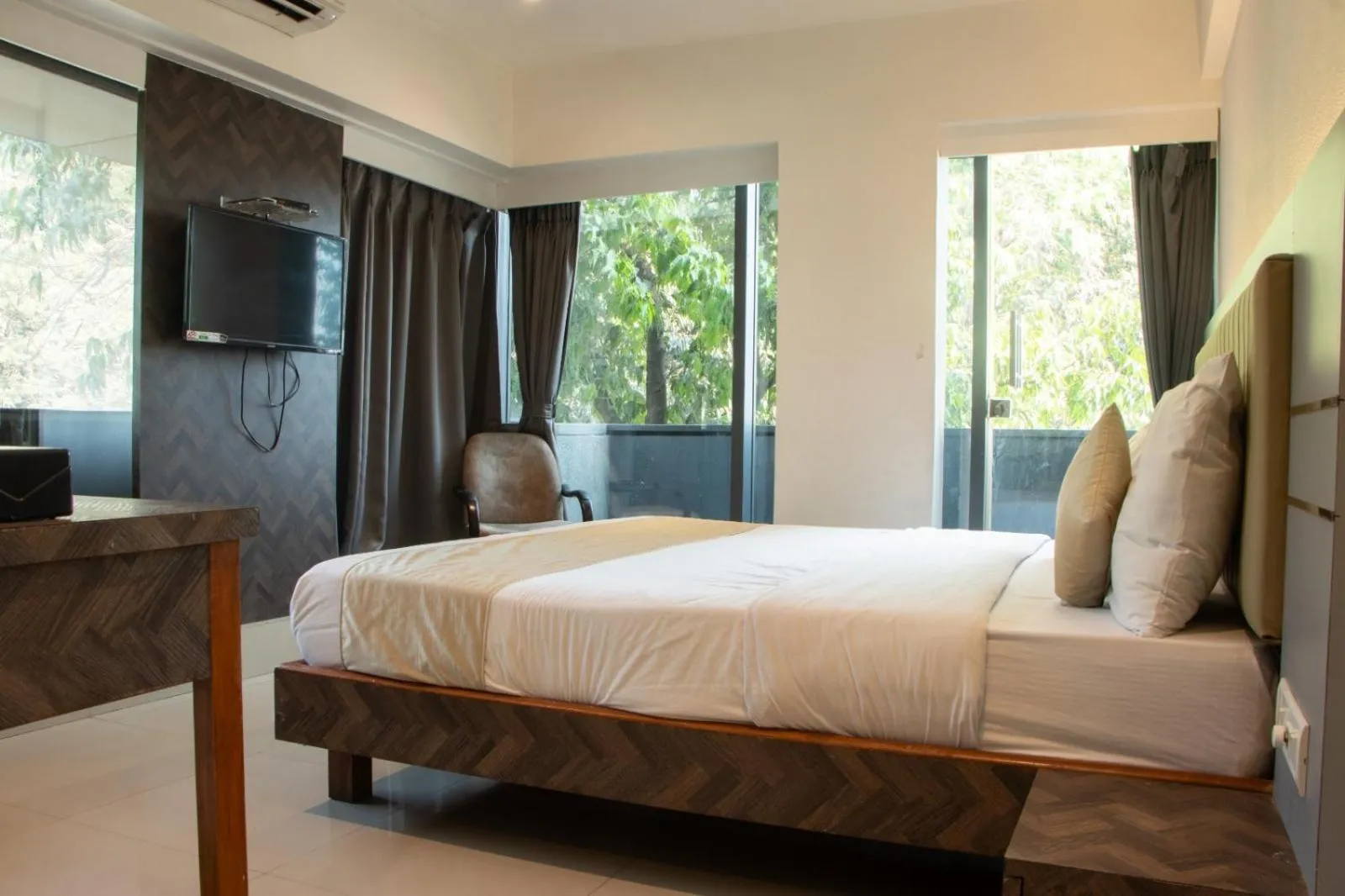 Photo of the whole room, Bed in J R Residency