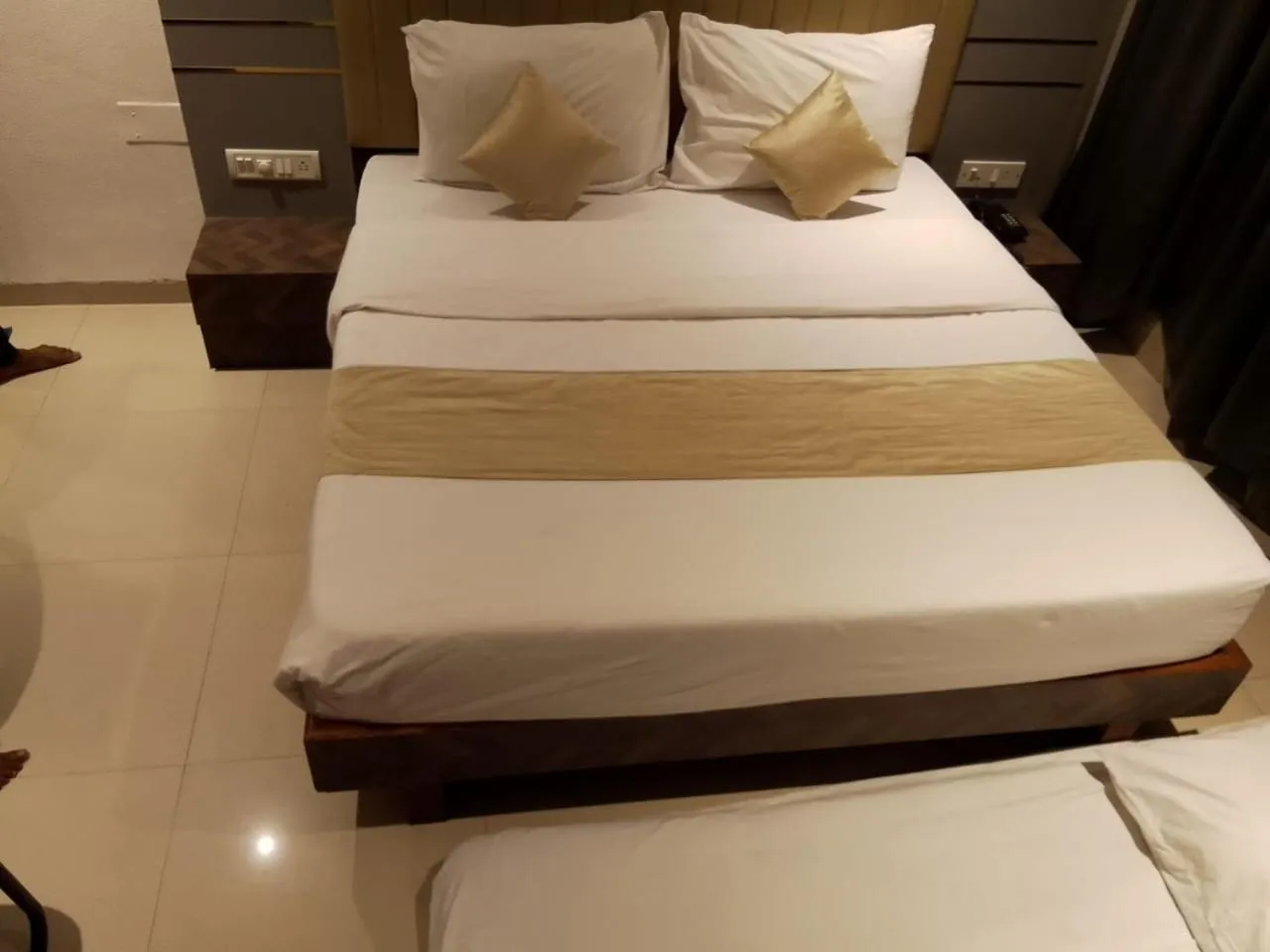 Bed in J R Residency