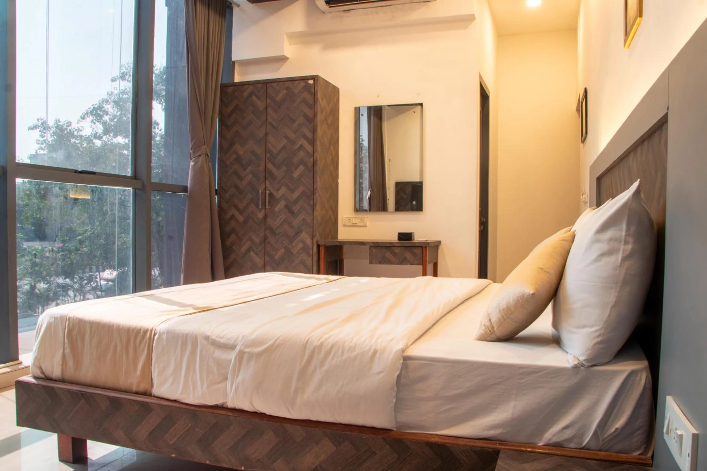 Bed in J R Residency