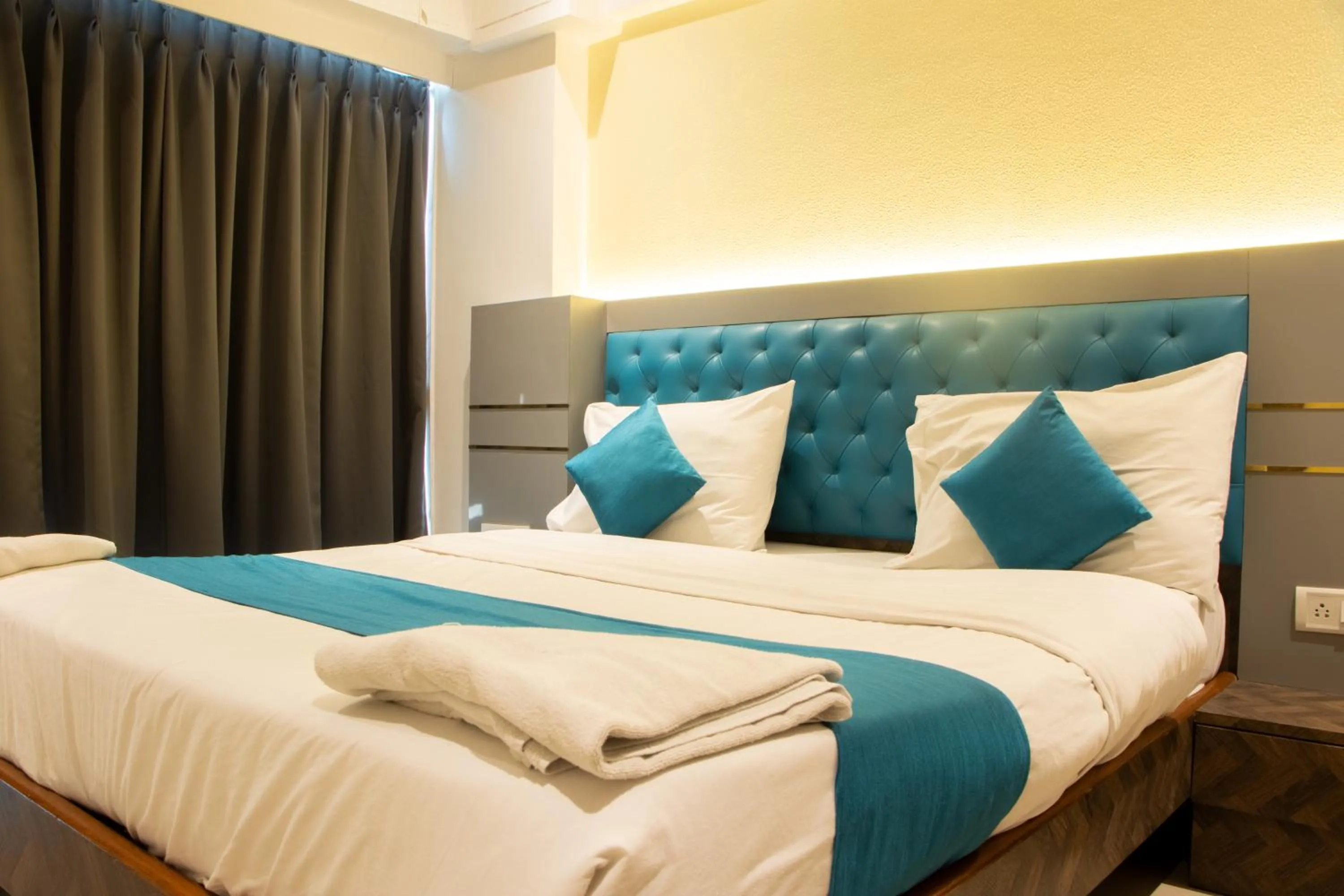 Bed in J R Residency