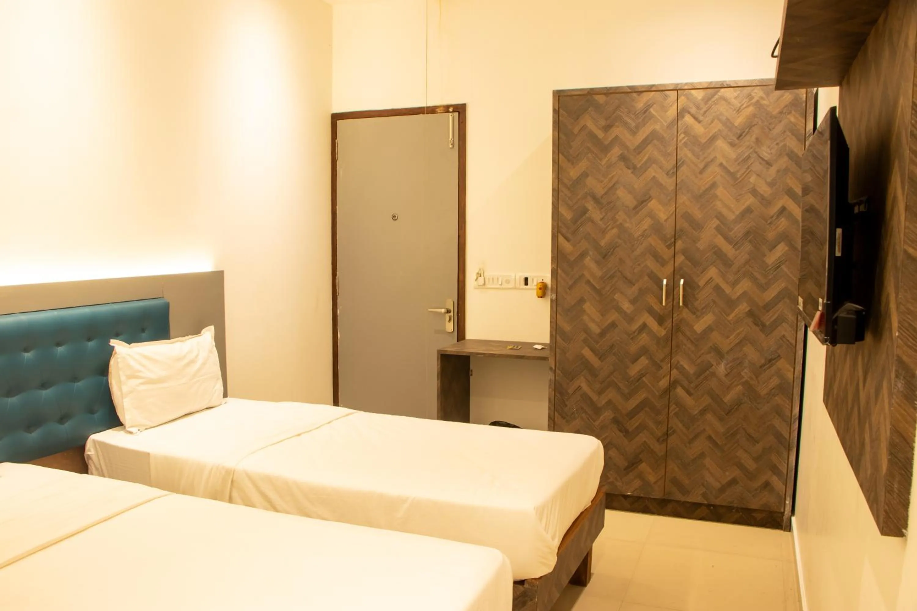 Bed in J R Residency
