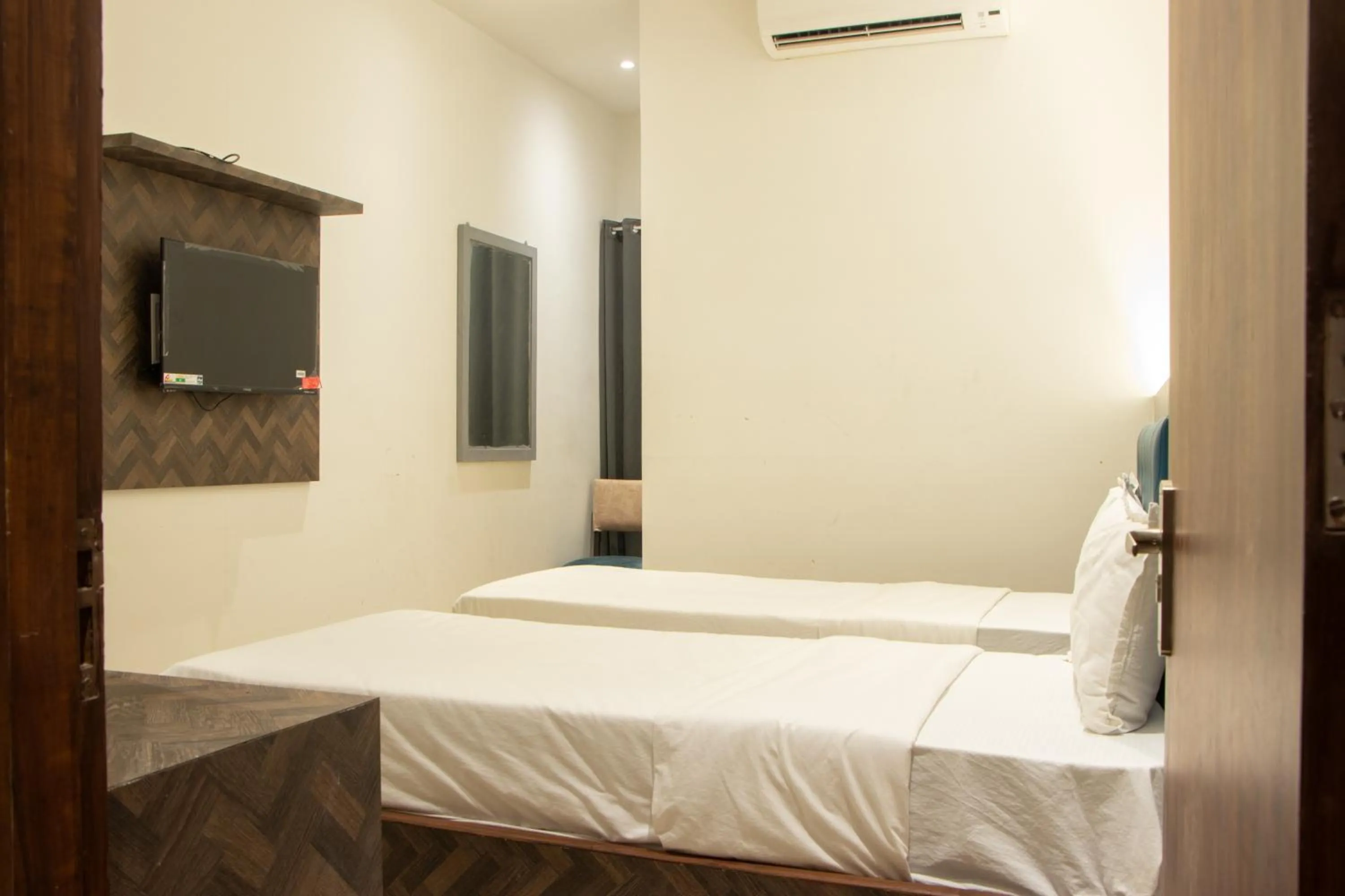 Bedroom, Bed in J R Residency