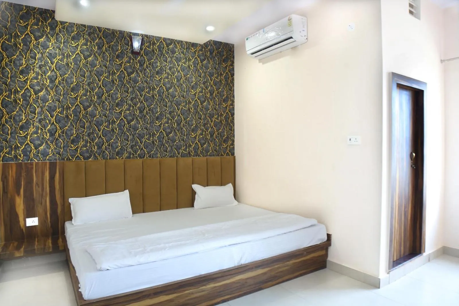 Photo of the whole room, Bed in Hotel Keshavam inn
