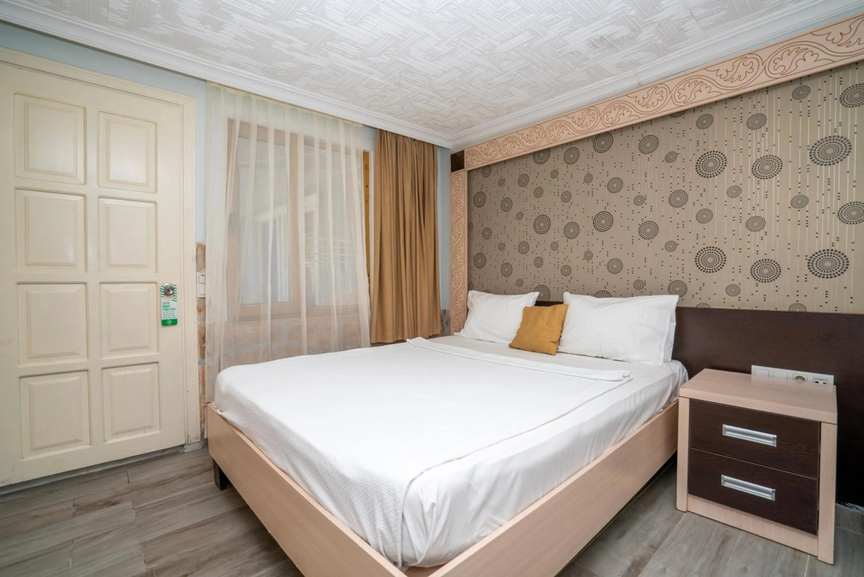 Bed in Aperion Beach Hotel Side