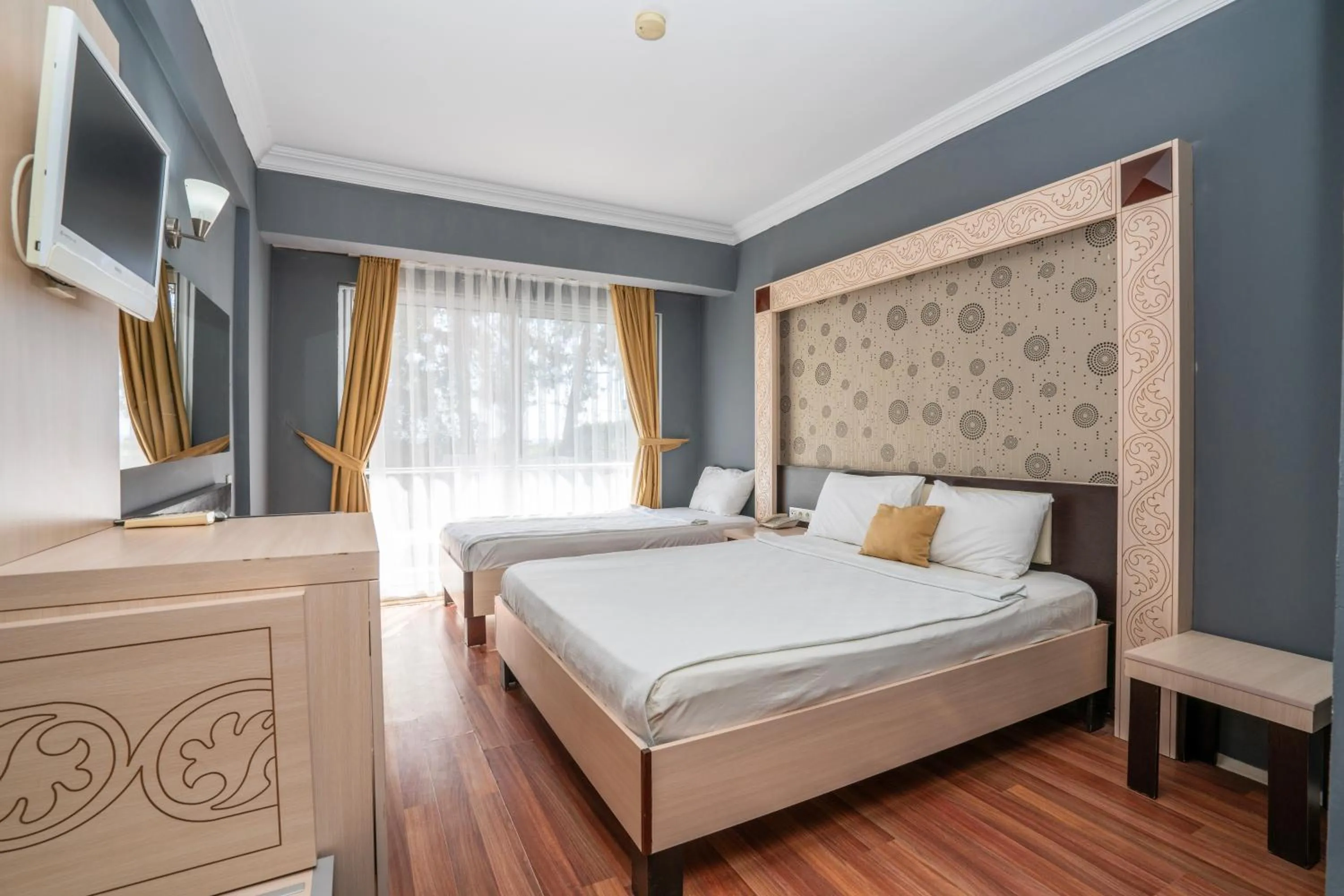 Bed in Aperion Beach Hotel Side