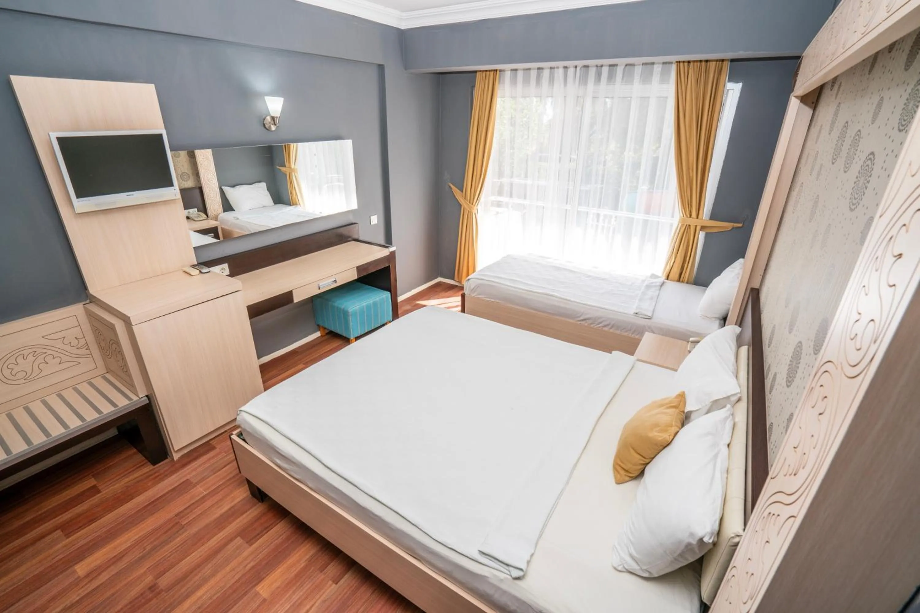 Bed in Aperion Beach Hotel Side