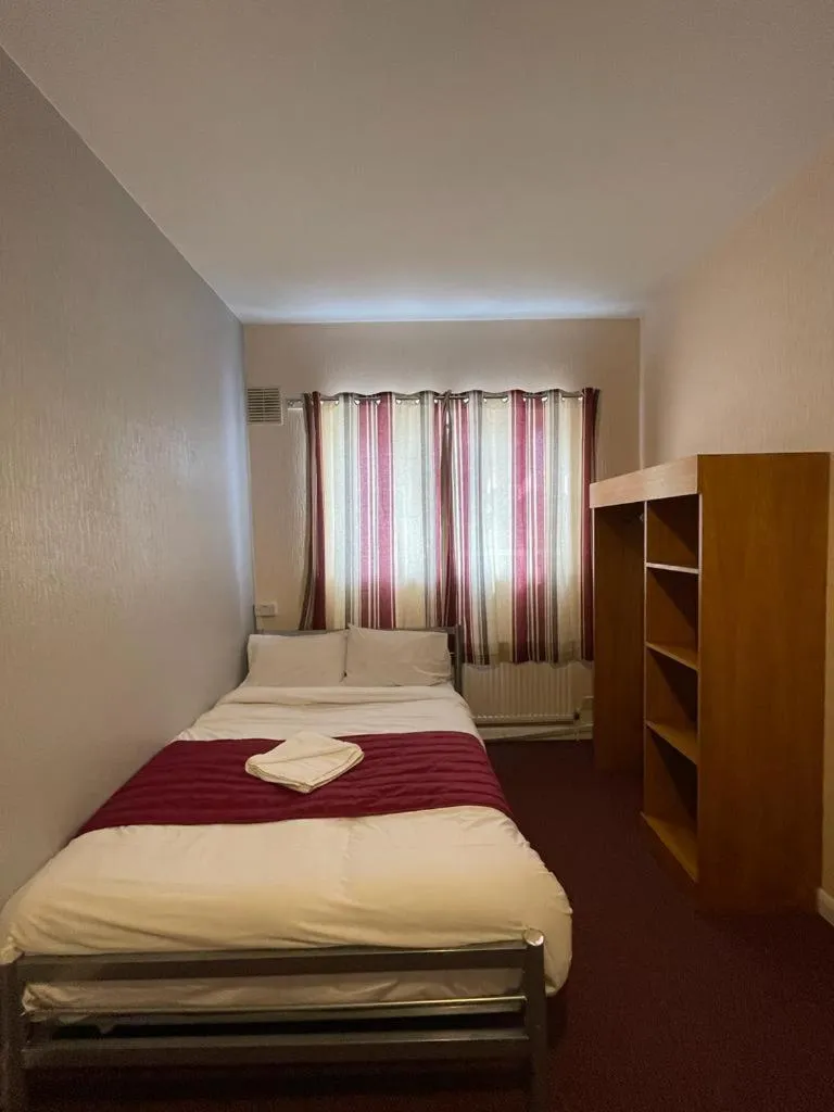 Bed in ST NICHOLAS HOTEL