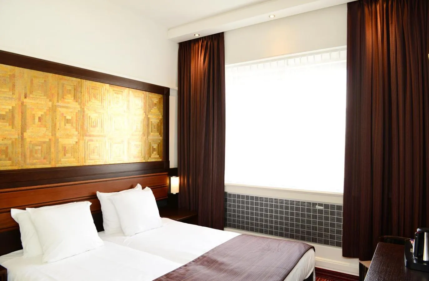 Bed in Amrâth Hotel DuCasque