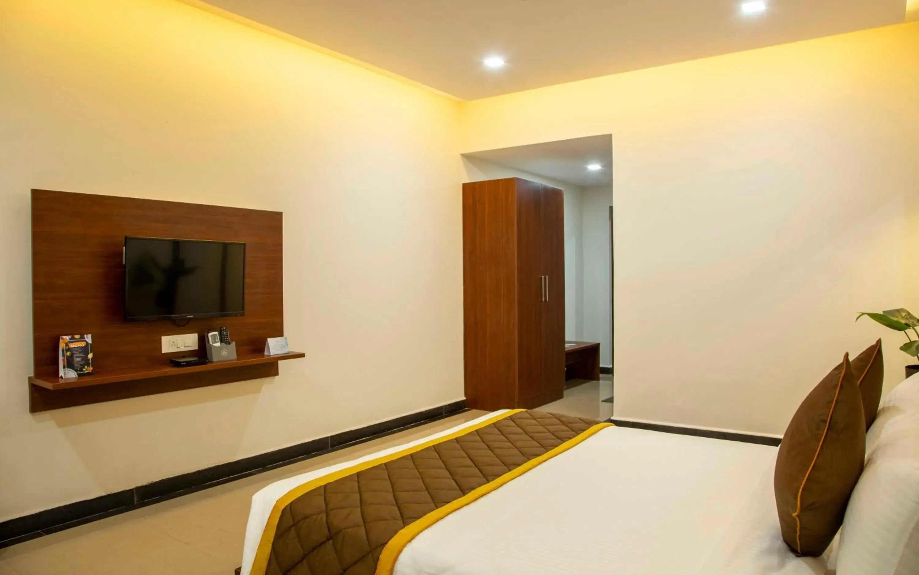 Communal lounge/ TV room, Bed in The Fortune Hotel By Swathi Group Communal lounge/ TV room, Bed in The Fortune Hotel By Swathi Group