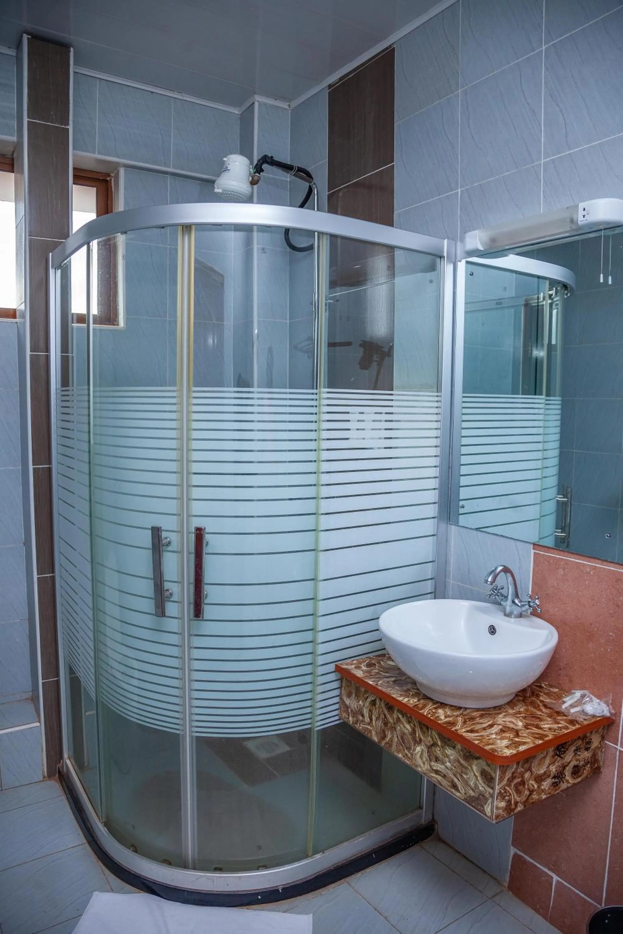 Shower in The Luke Hotel Cravers Thika