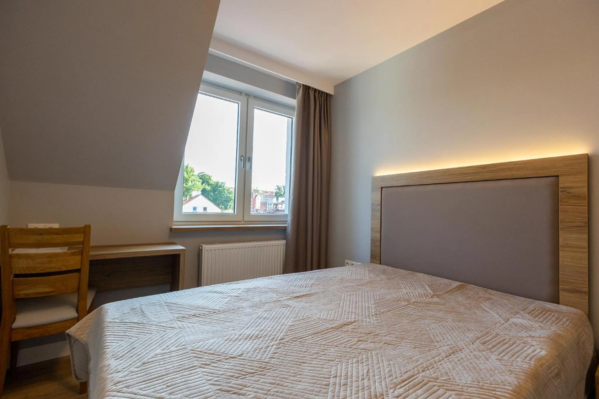 Bed in Ostróda City Center Top floor lake view & balcony apartment