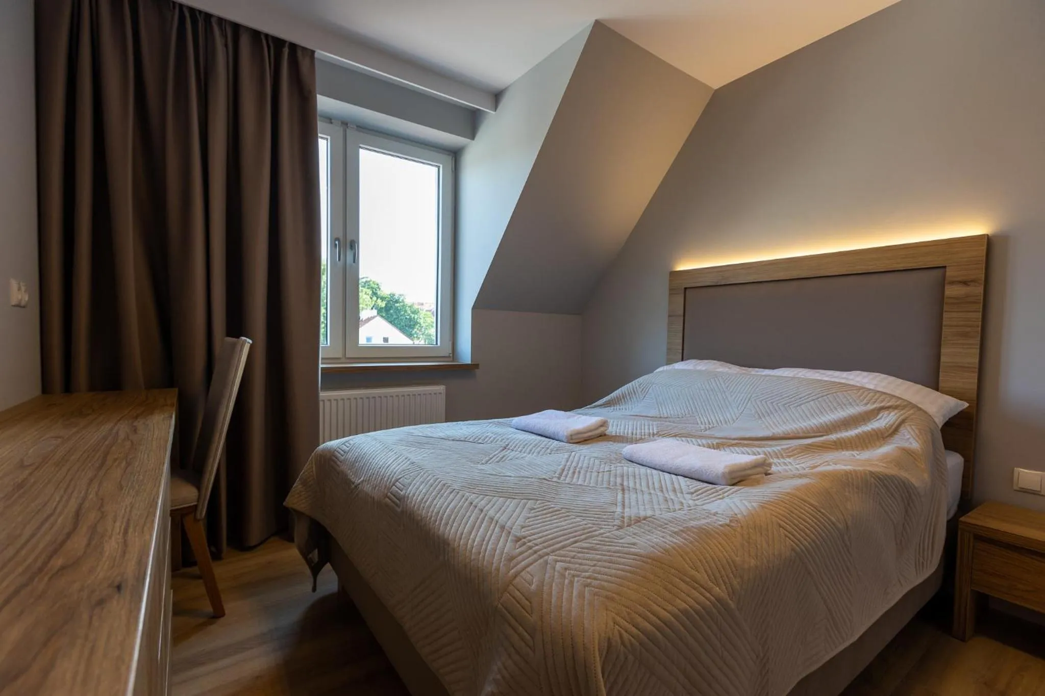 Bed in Ostróda City Center Top floor lake view & balcony apartment