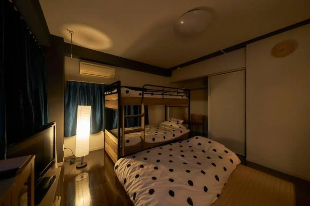Bed in Oyado Kinokuniya Daikokumachi