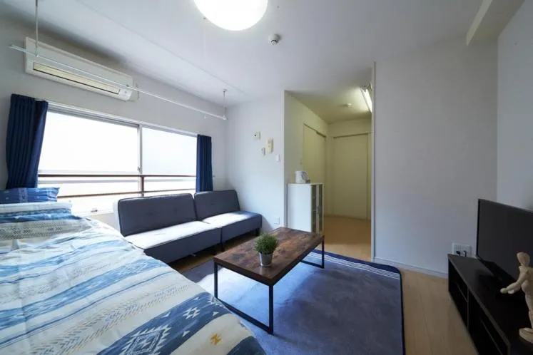 Bed in Oyado Kinokuniya Daikokumachi