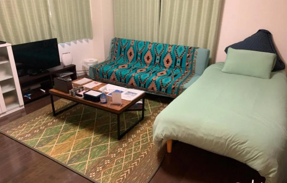 Bed in Oyado Kinokuniya Daikokumachi