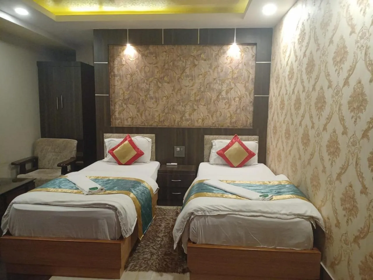 Bed in The Brahmaputra Hotel
