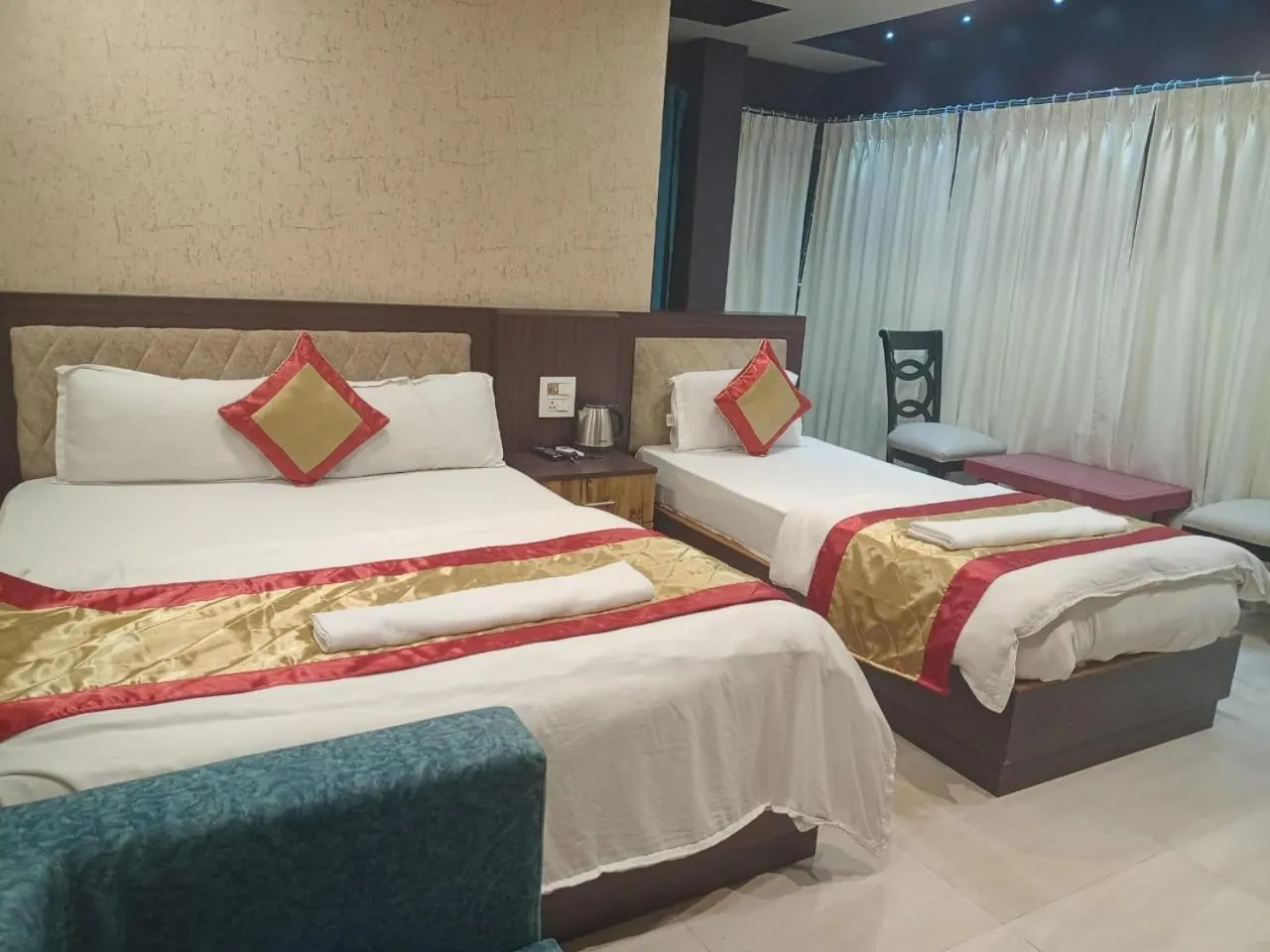 Bed in The Brahmaputra Hotel