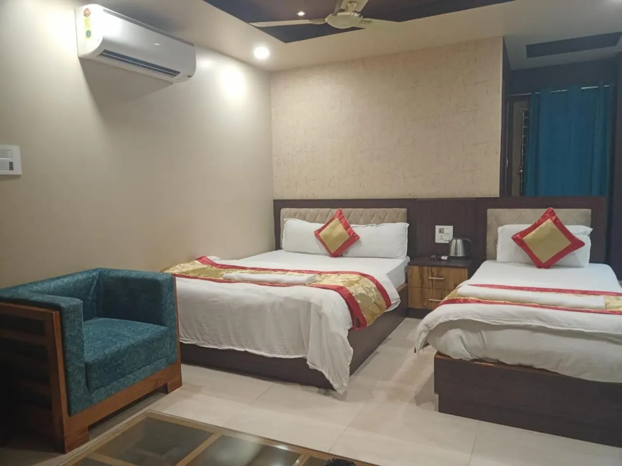 Bed in The Brahmaputra Hotel