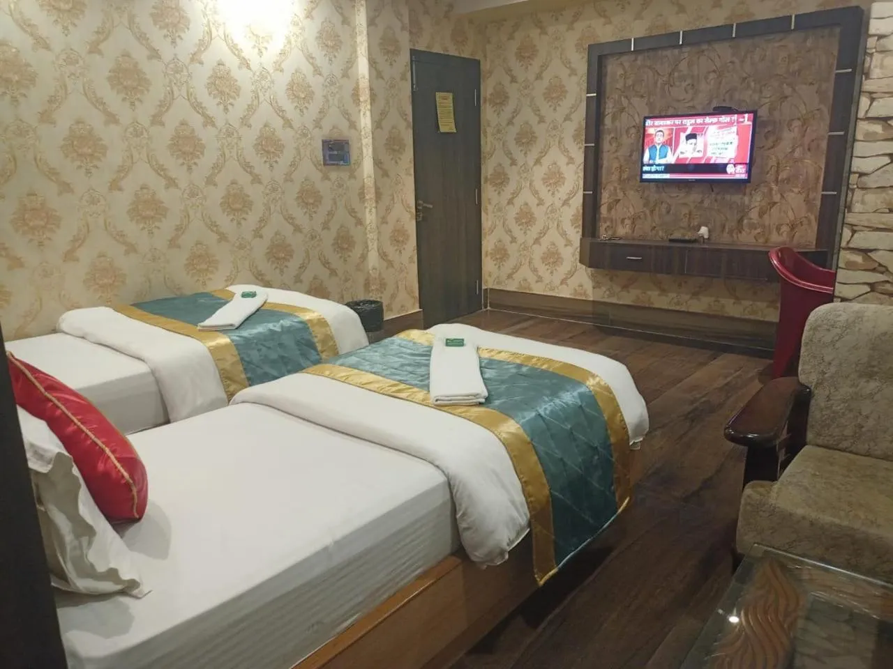 Bed in The Brahmaputra Hotel