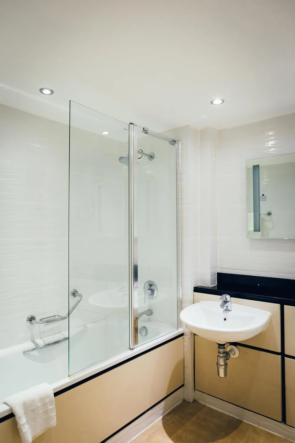 Bathroom in voco Letchworth Hall by IHG