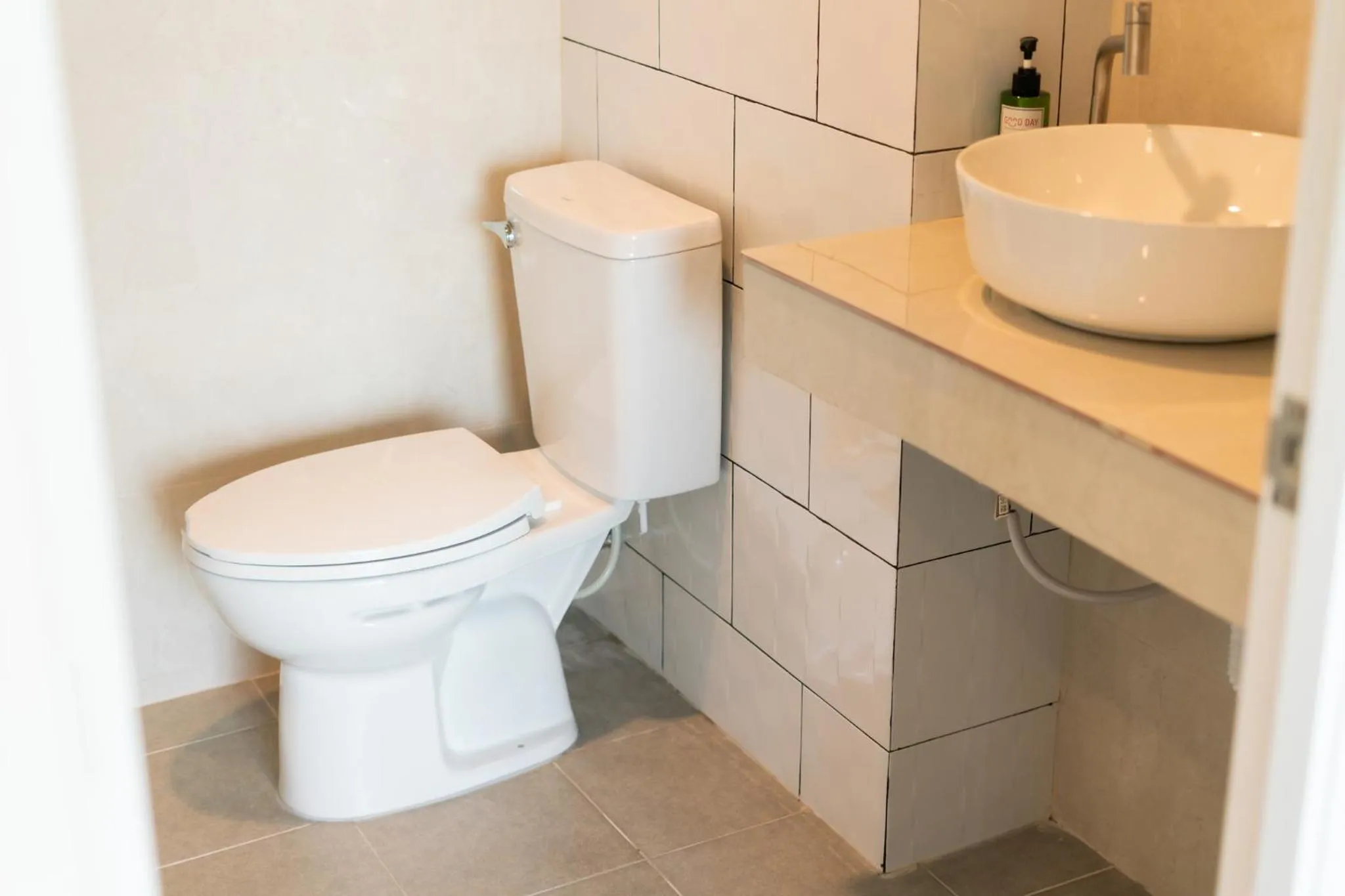 Toilet in Goodday Hotel