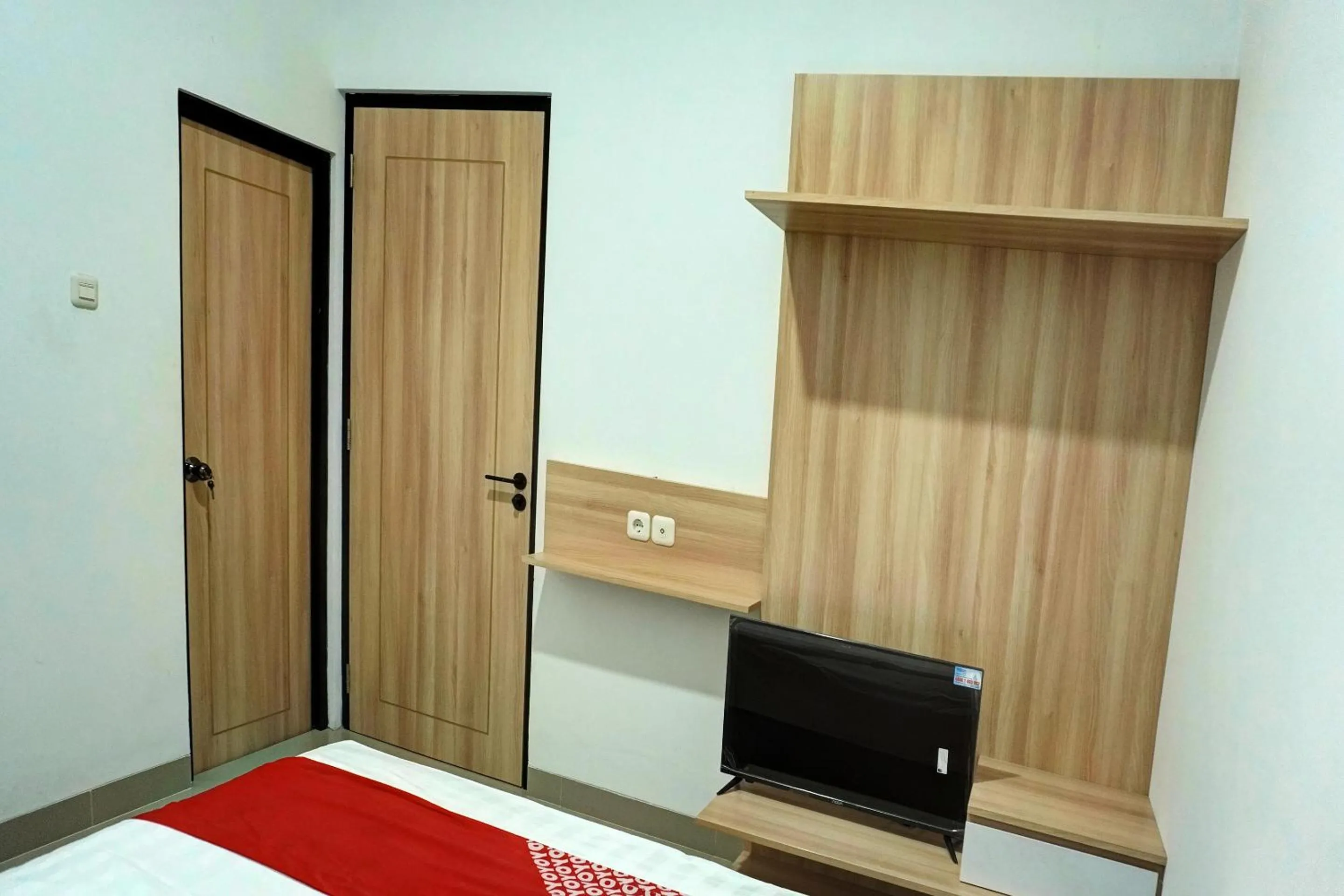 Bedroom in Capital O 92804 La Tansa Syariah Hotel