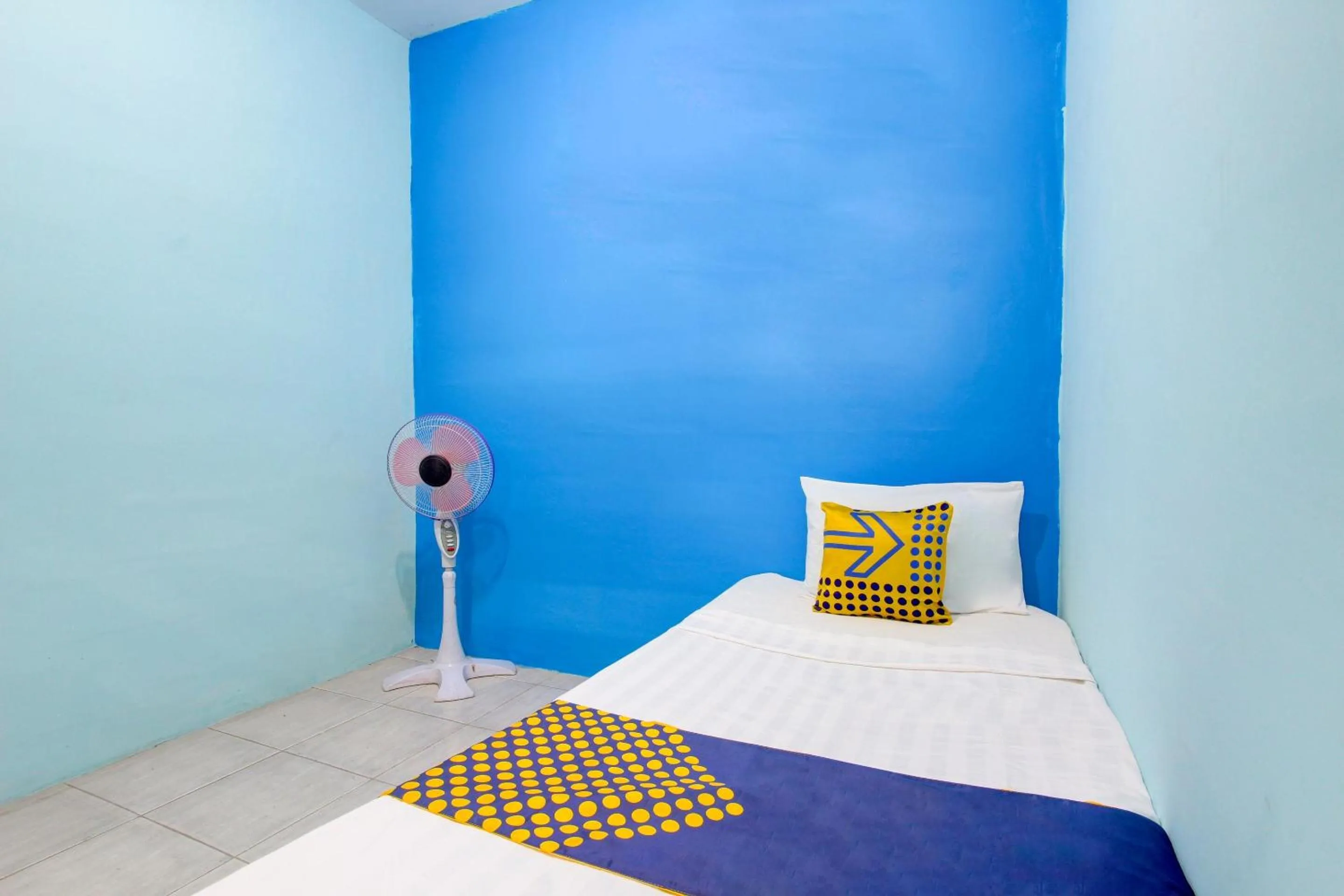 Bedroom in Hotel O Gioba Kost Syariah