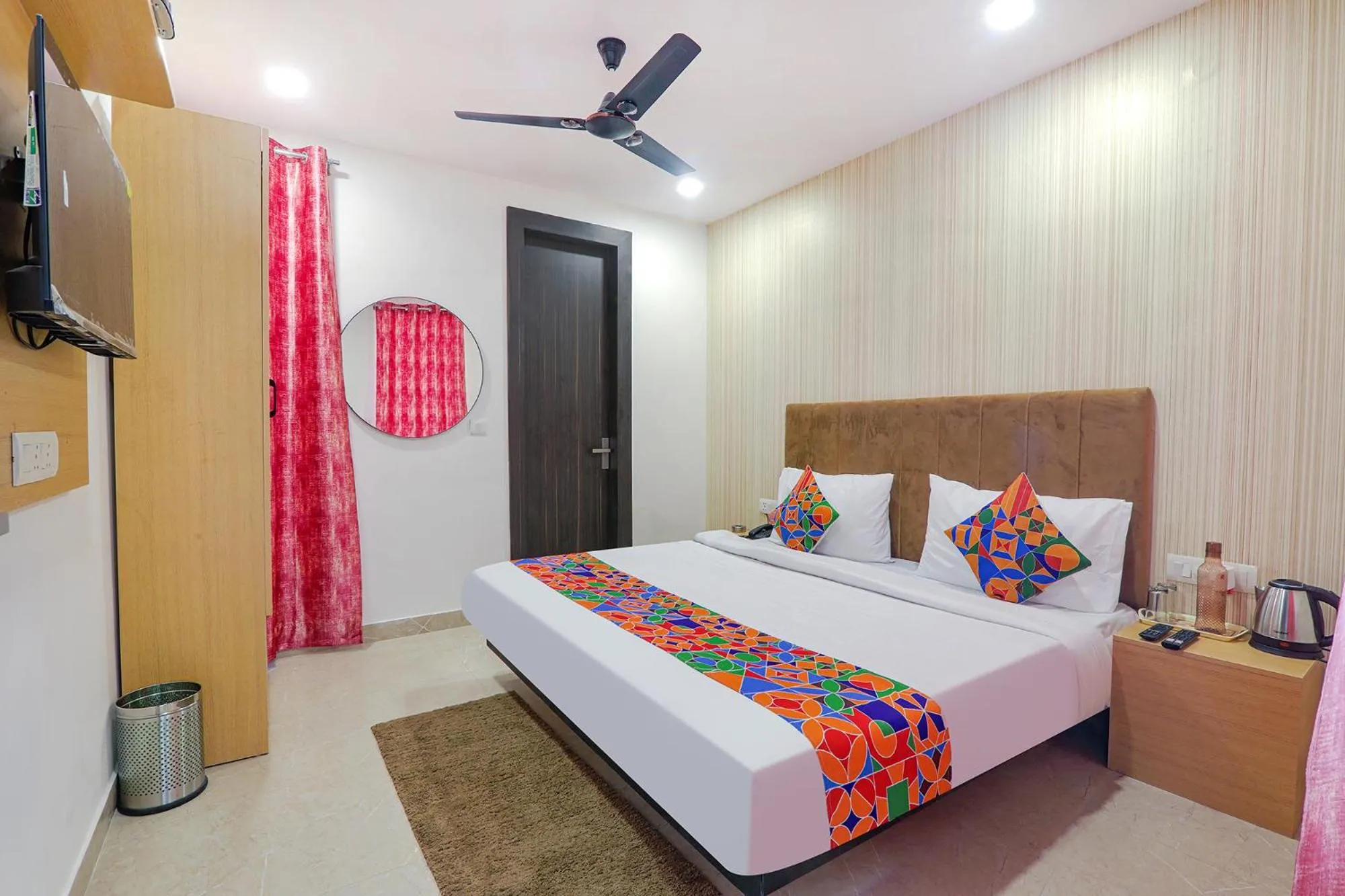 Bed in FabHotel The Comfort