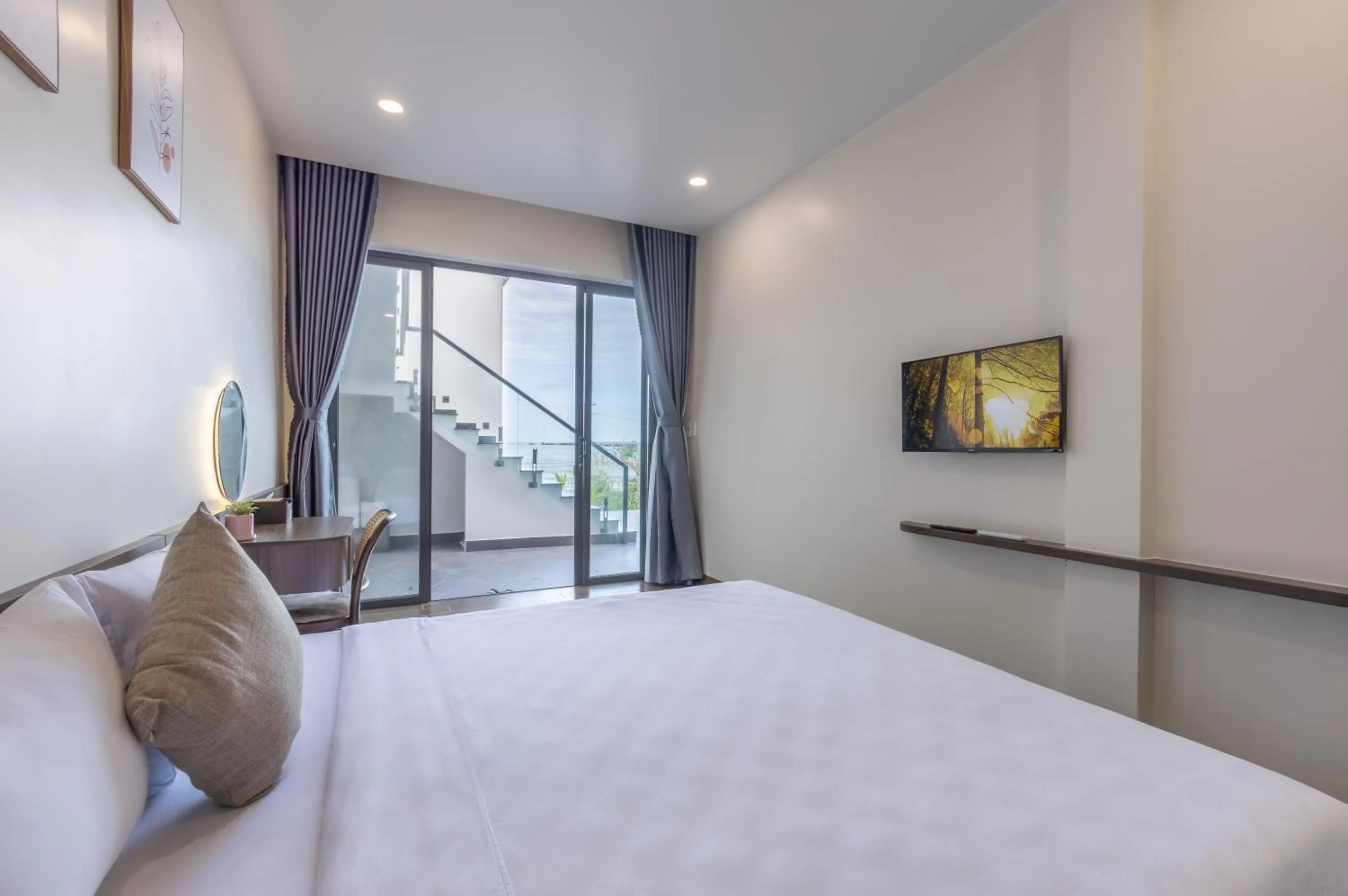 Photo of the whole room, Bed in Wave Sound Beach House Phu Quoc