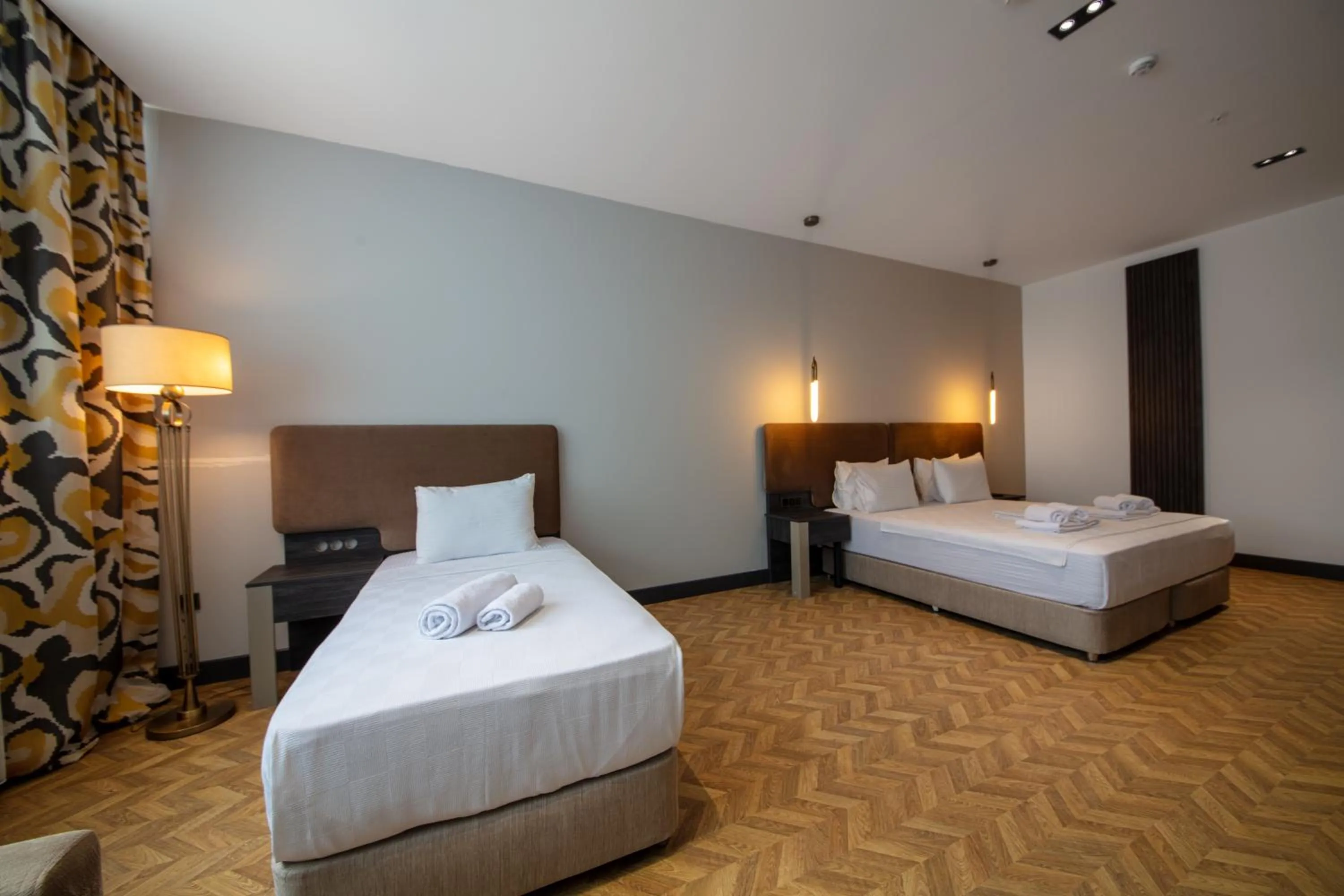 Bed in V Center Hotel