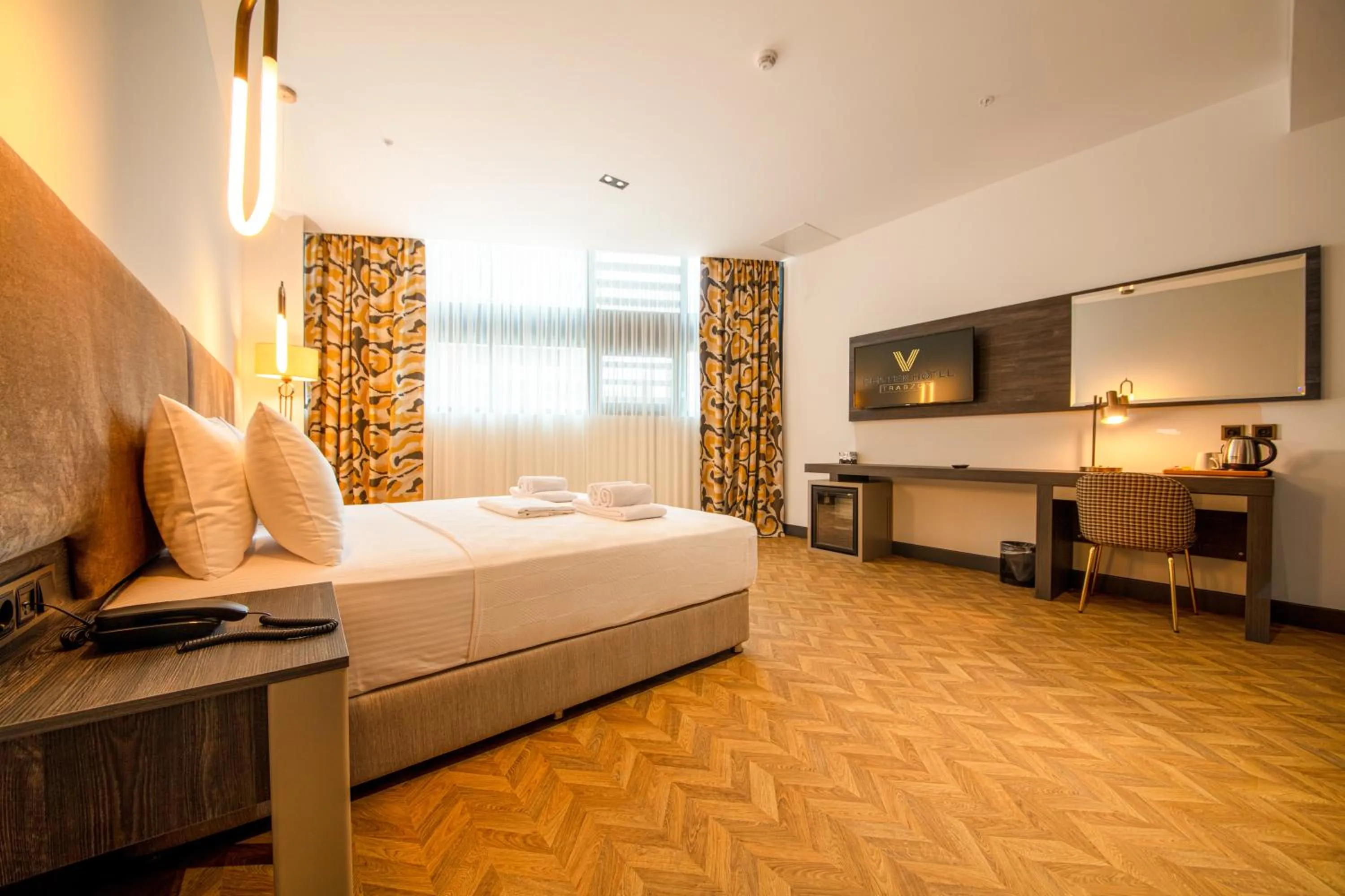 Bed in V Center Hotel