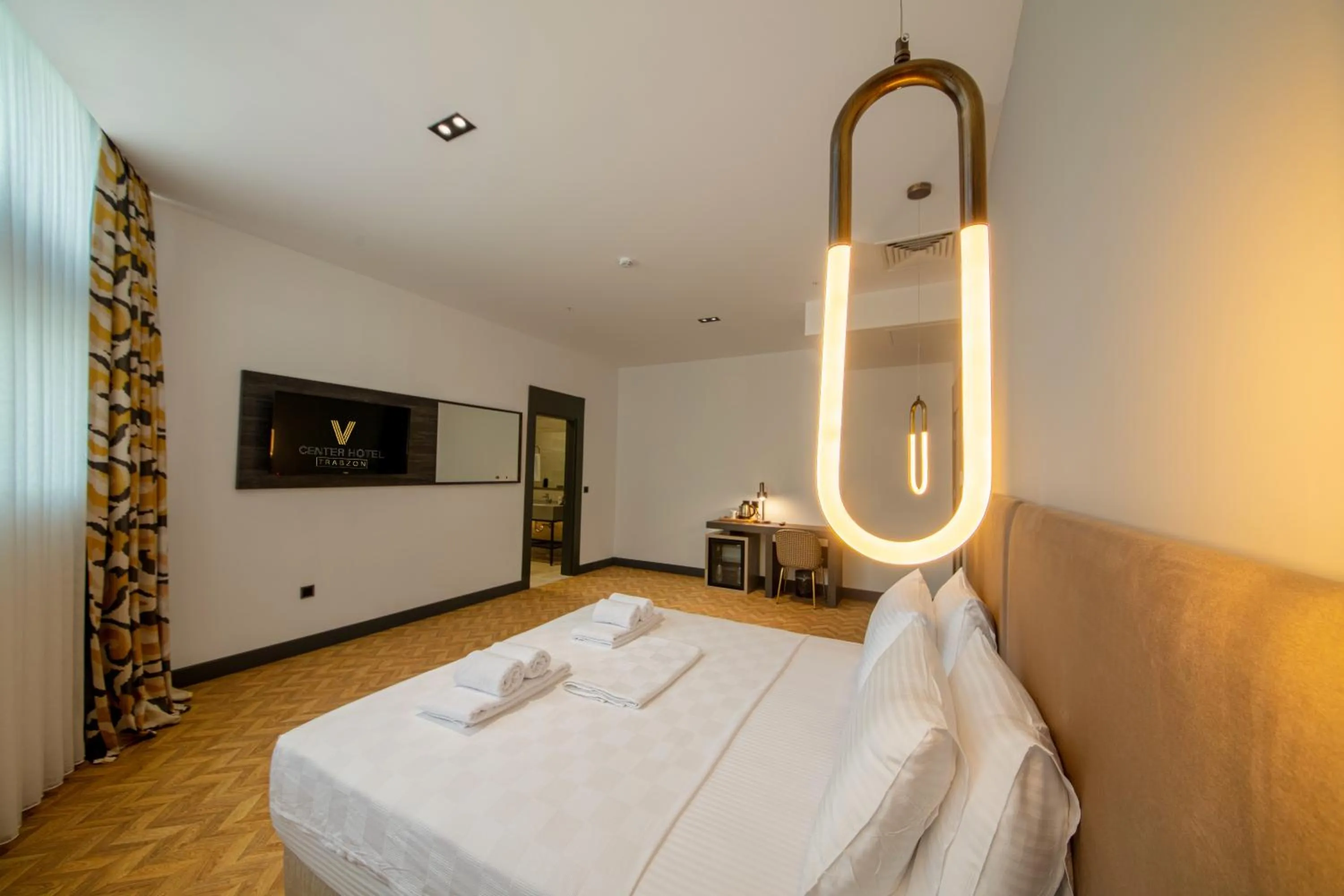 Bed in V Center Hotel