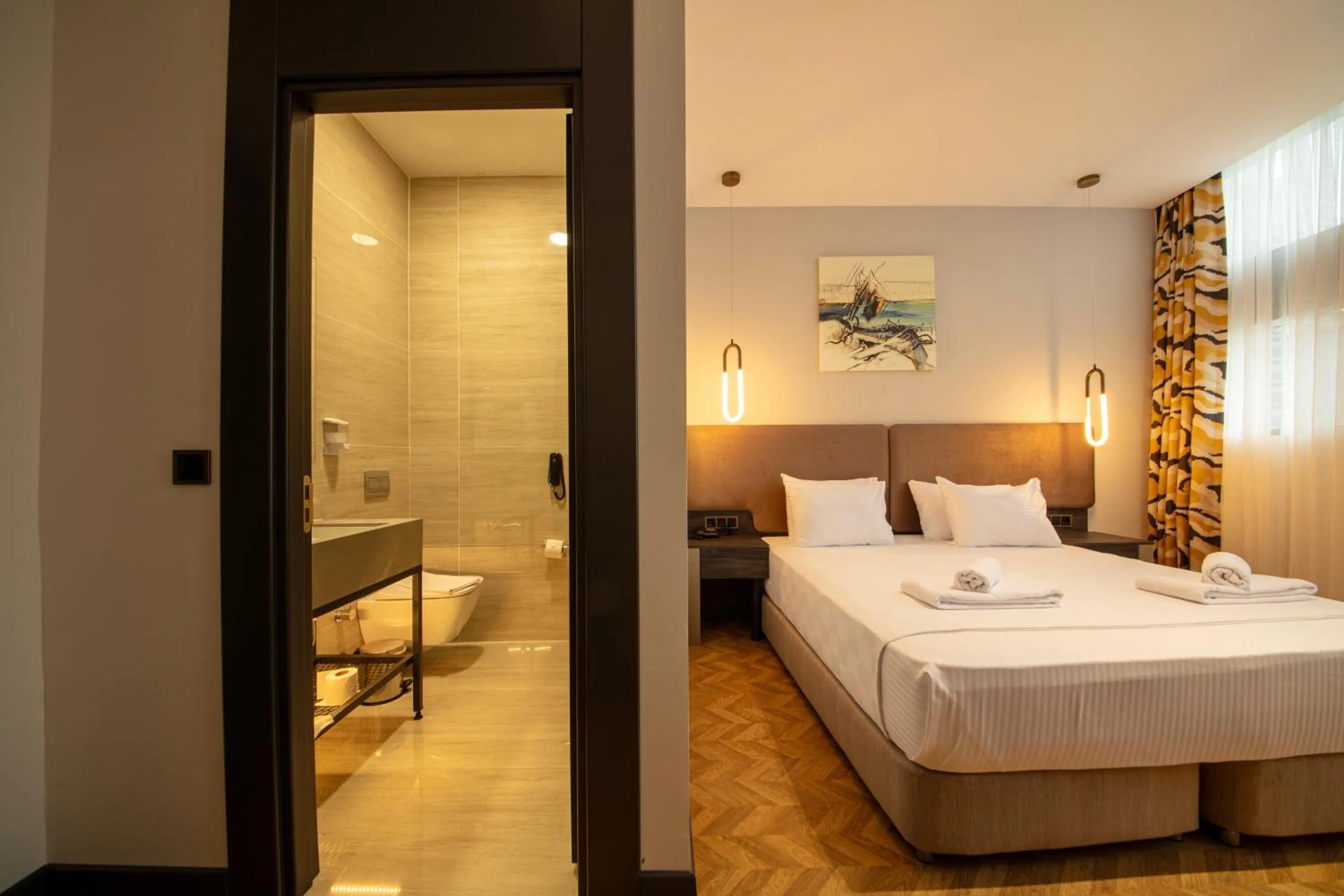 Bed in V Center Hotel